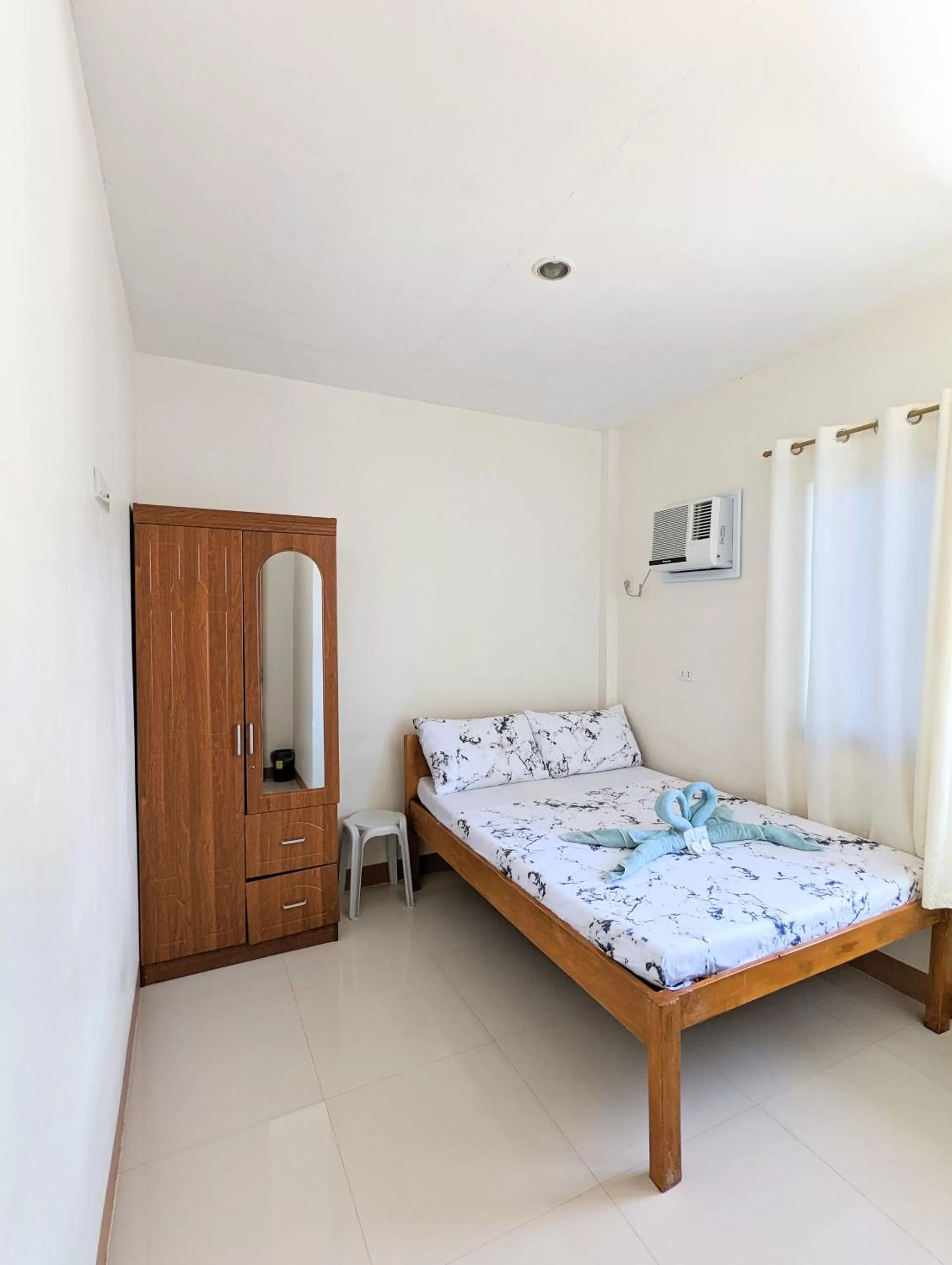 Bed in Charlina Inn Panglao