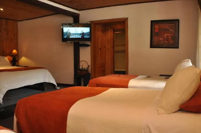 Bed in Hacienda Hostería Dos Chorreras