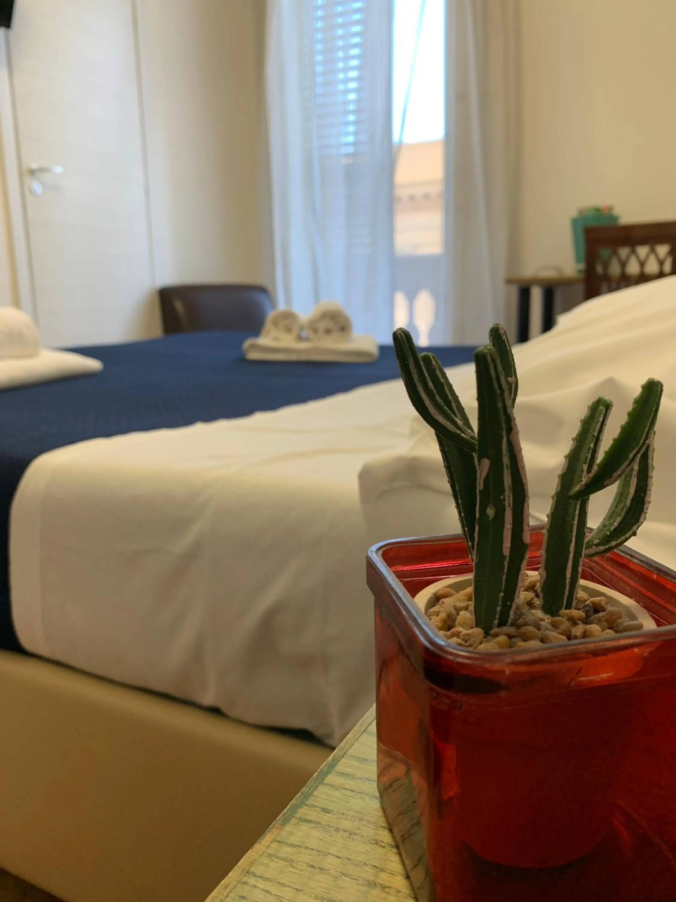 Bed in 38 Aira Hotels