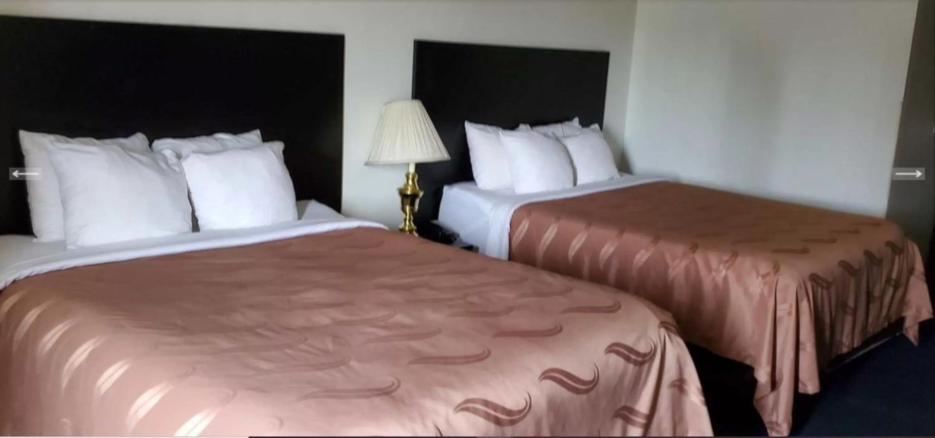 Bedroom, Bed in FairBridge Inn & Suites Sunnyside