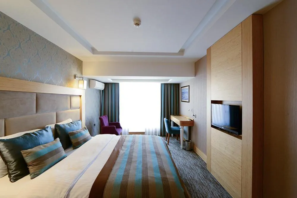 Bed in The Berussa Hotel