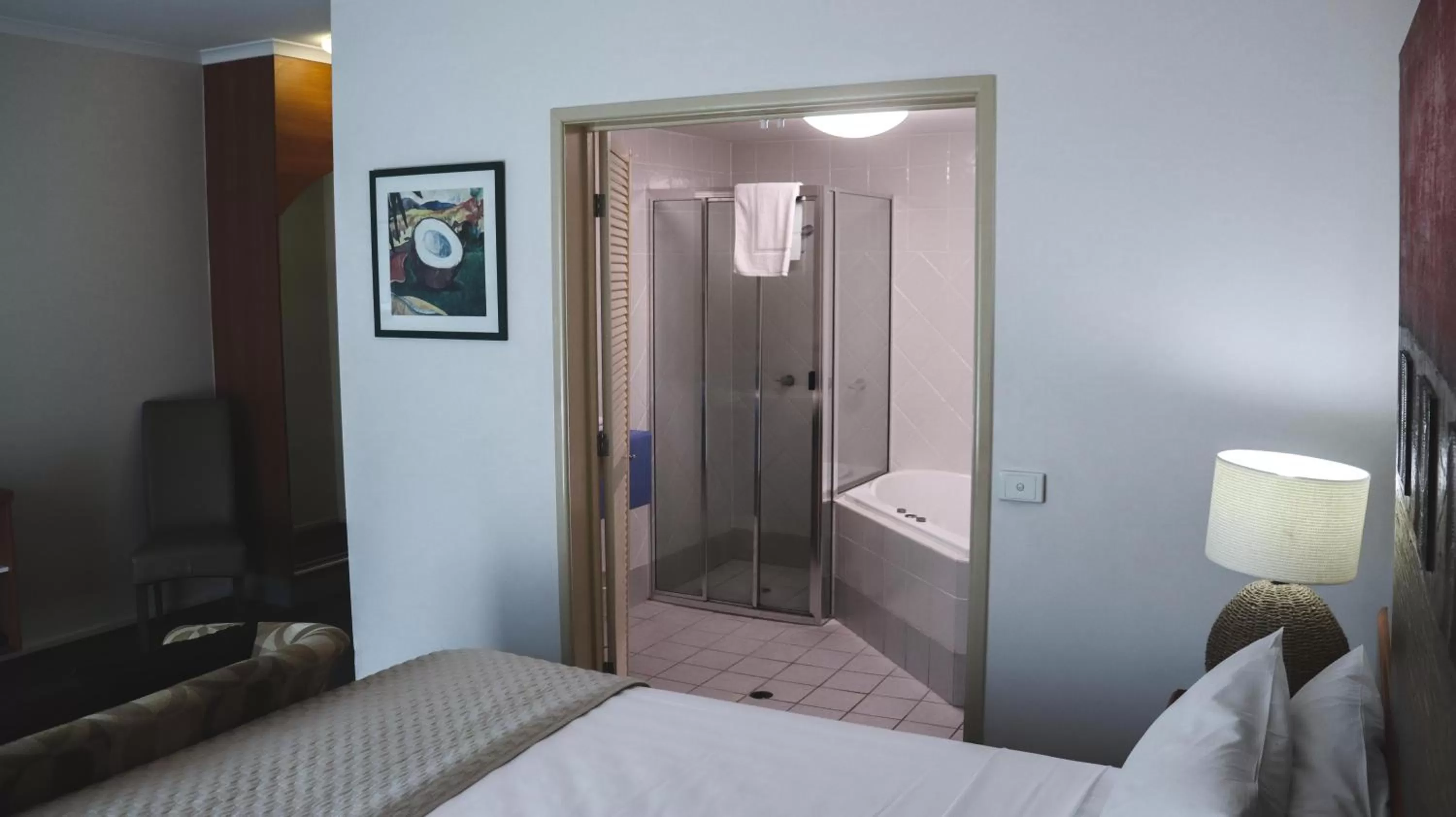 Bathroom, Bed in Heritage Cairns Hotel