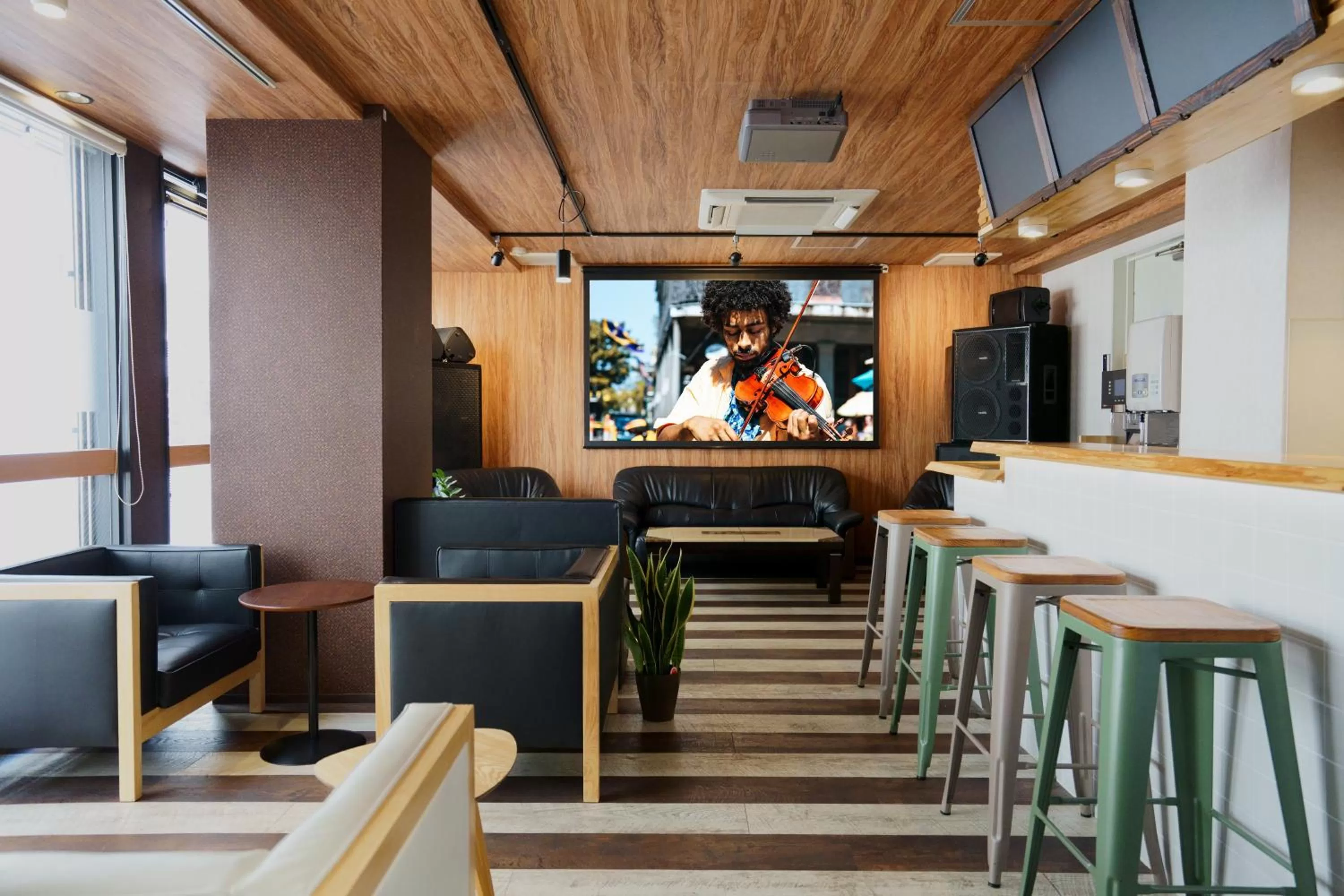 Communal lounge/ TV room in Feel Osaka Yu