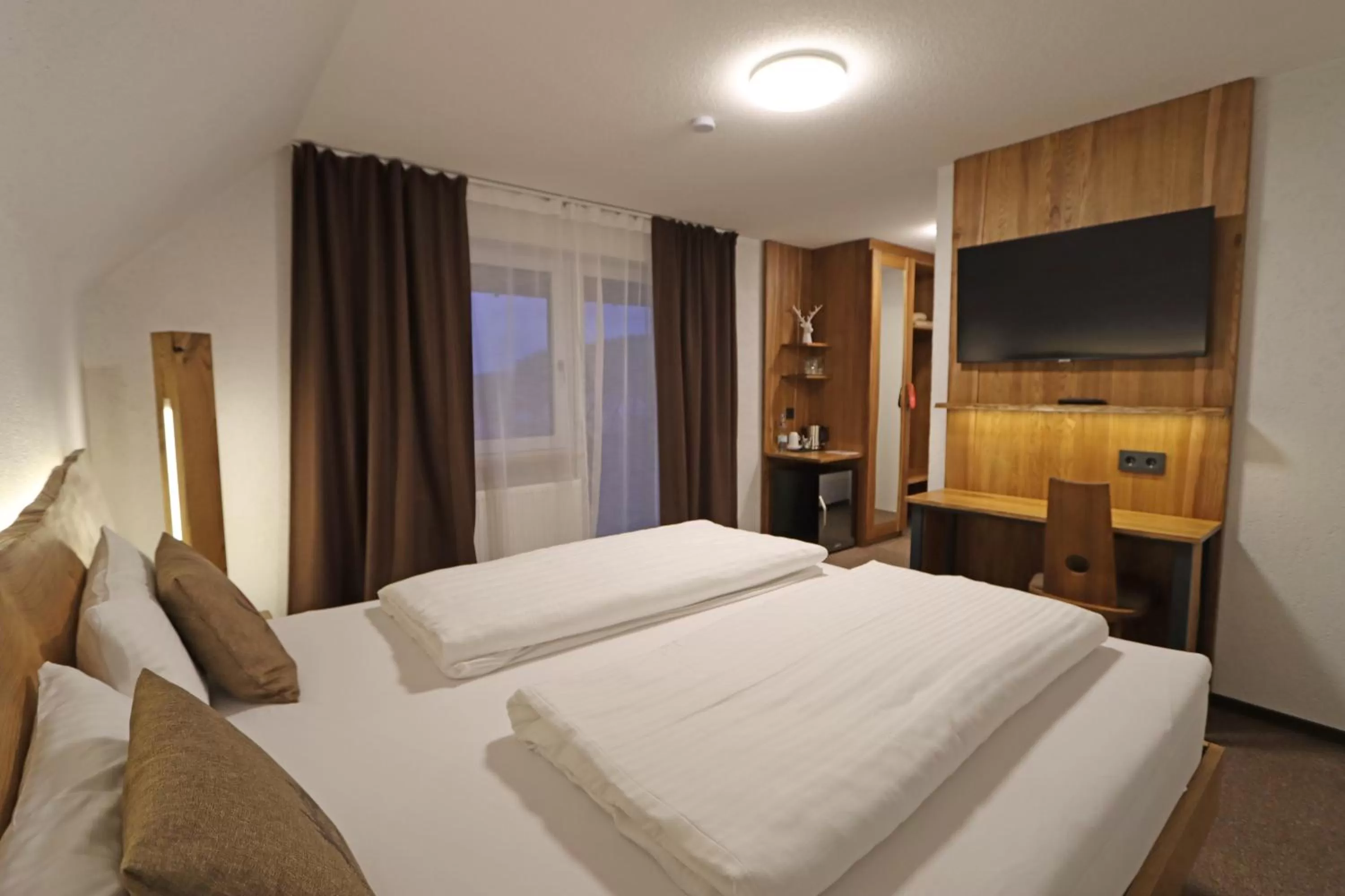 Bed in Hotel Kreuz Höhengasthof