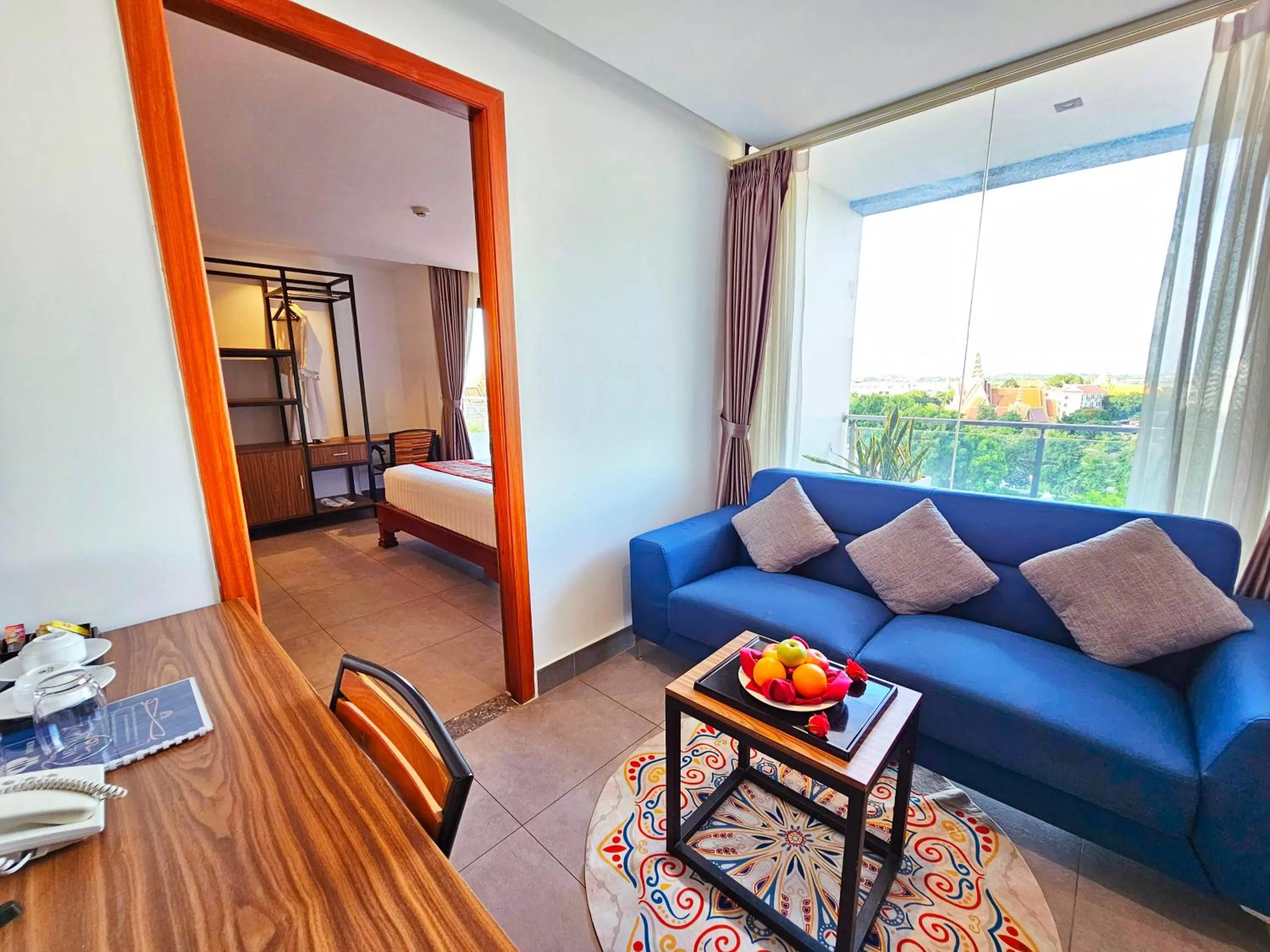 Living room, Bed in Le Botum Hotel