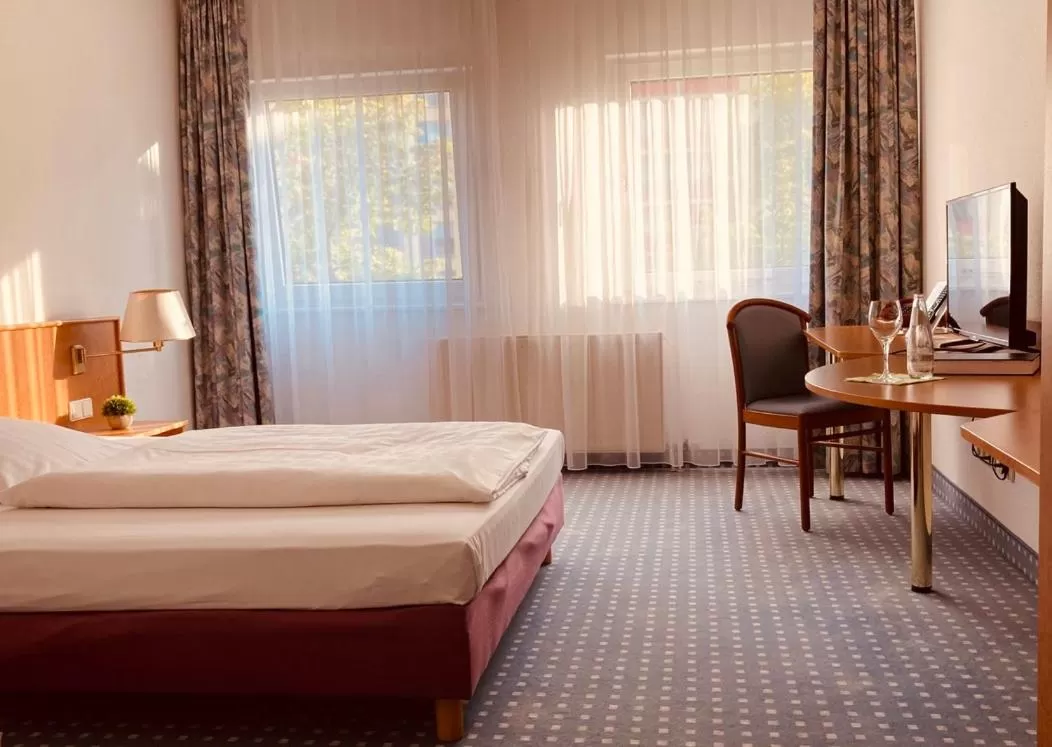 Bed in Akzent Congresshotel Hoyerswerda