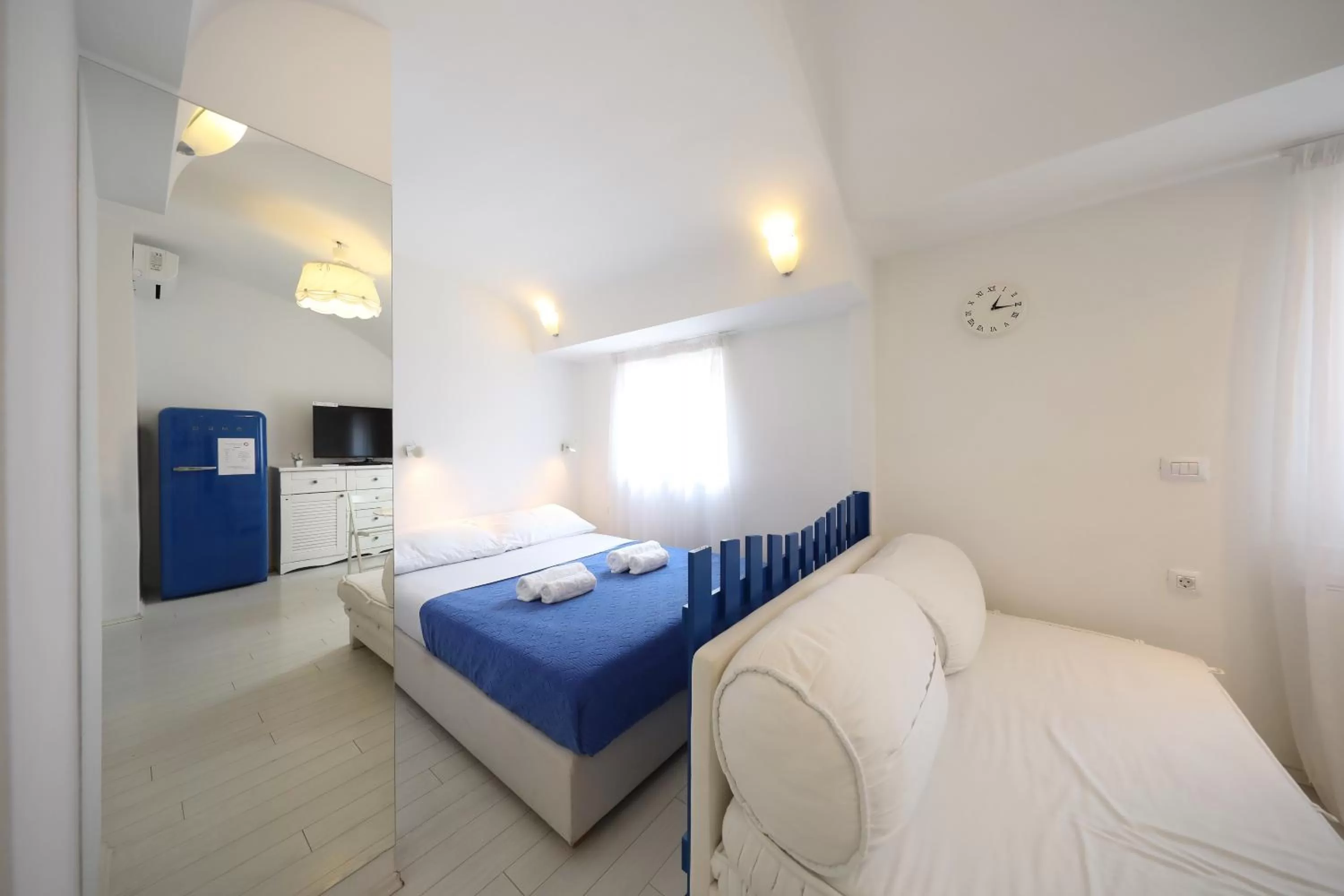 Bed in Central Apartments Integrated Hotel