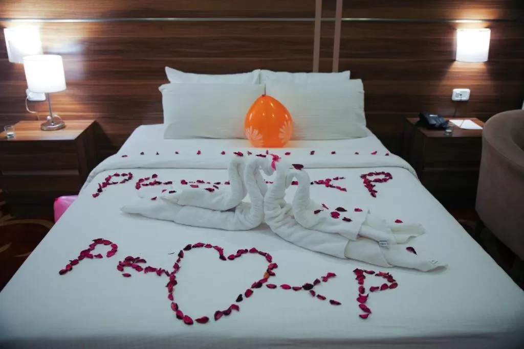 Bed in Spark Plaza Hotel