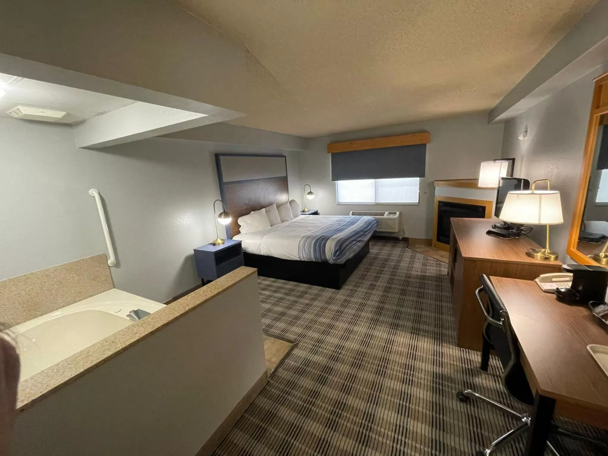 Photo of the whole room, Bed in AmericInn by Wyndham Sayre