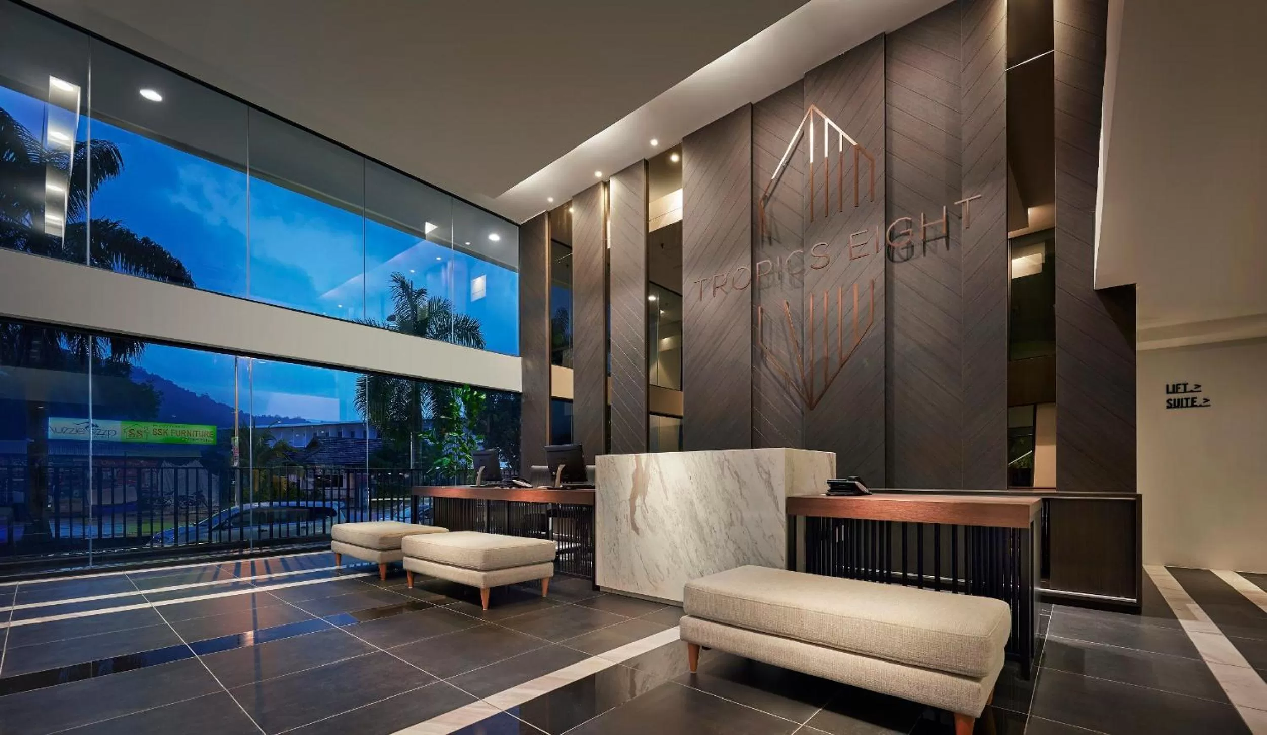 Communal lounge/ TV room in Tropics Eight Suites