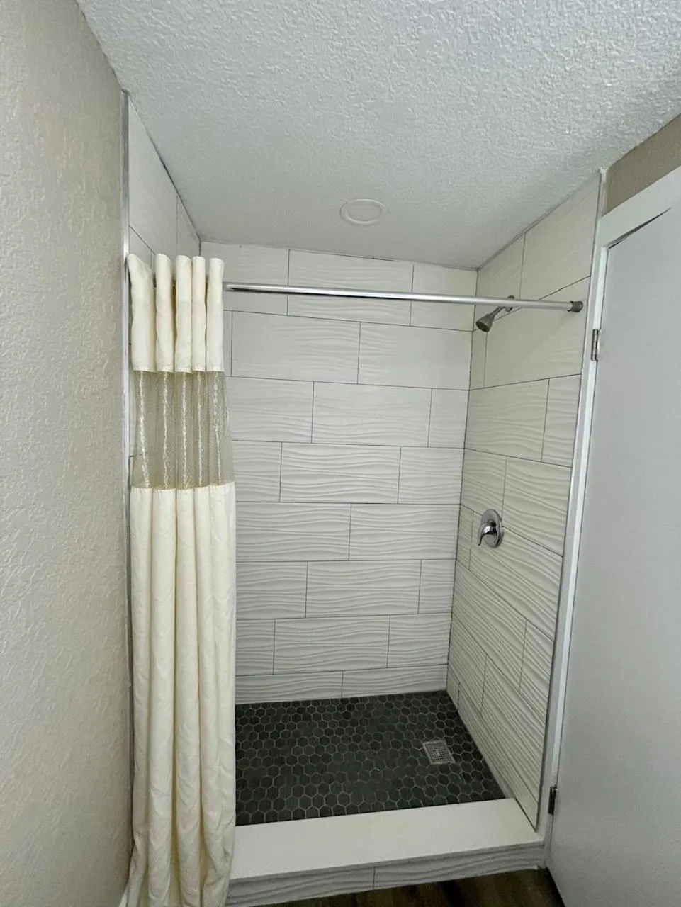 Shower in Super 8 by Wyndham Kissimmee-Orlando