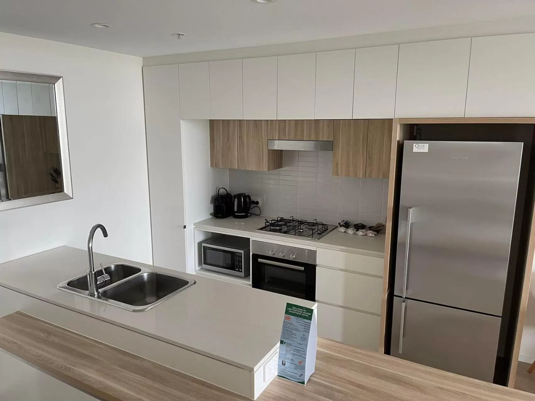 Kitchen or kitchenette in Link Portside Wharf Apartment Hotel