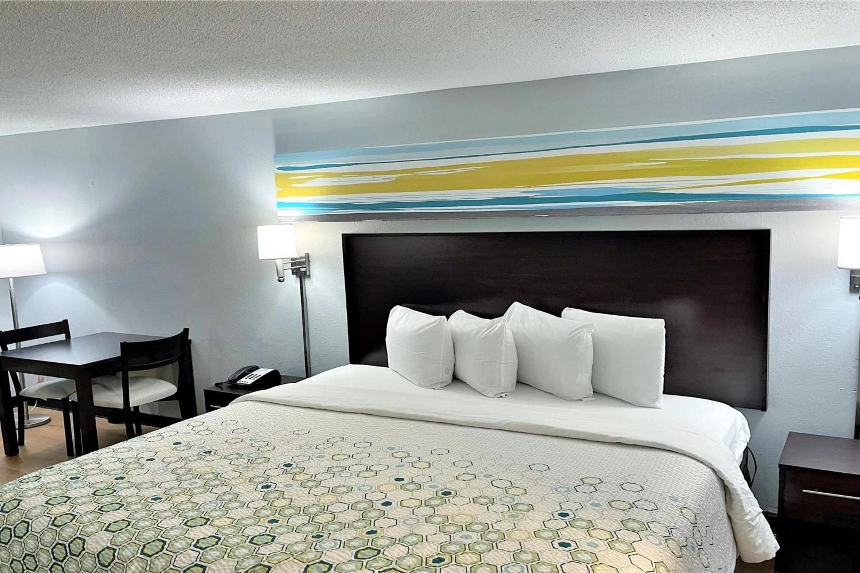 Bedroom, Bed in HomeTowne Studios by Red Roof Augusta