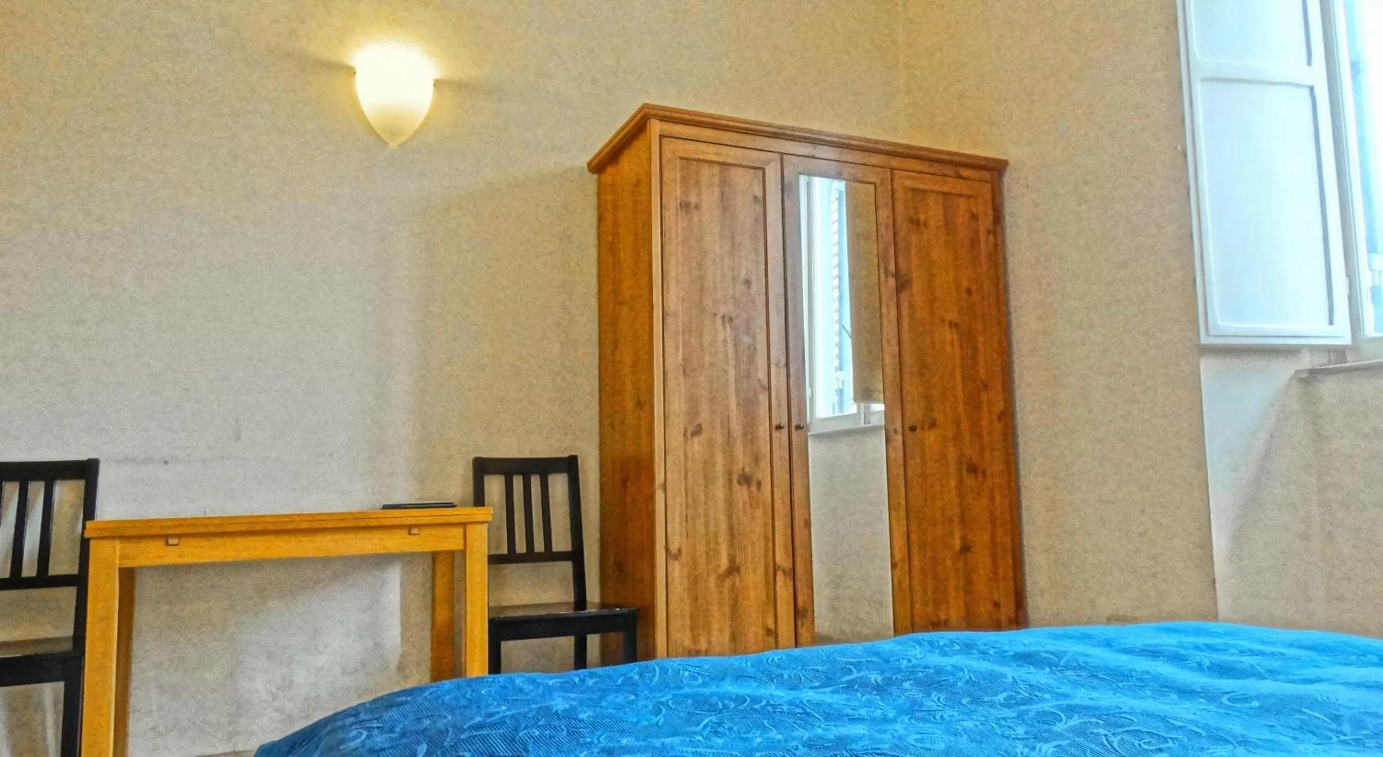 Photo of the whole room, Bed in Gite House