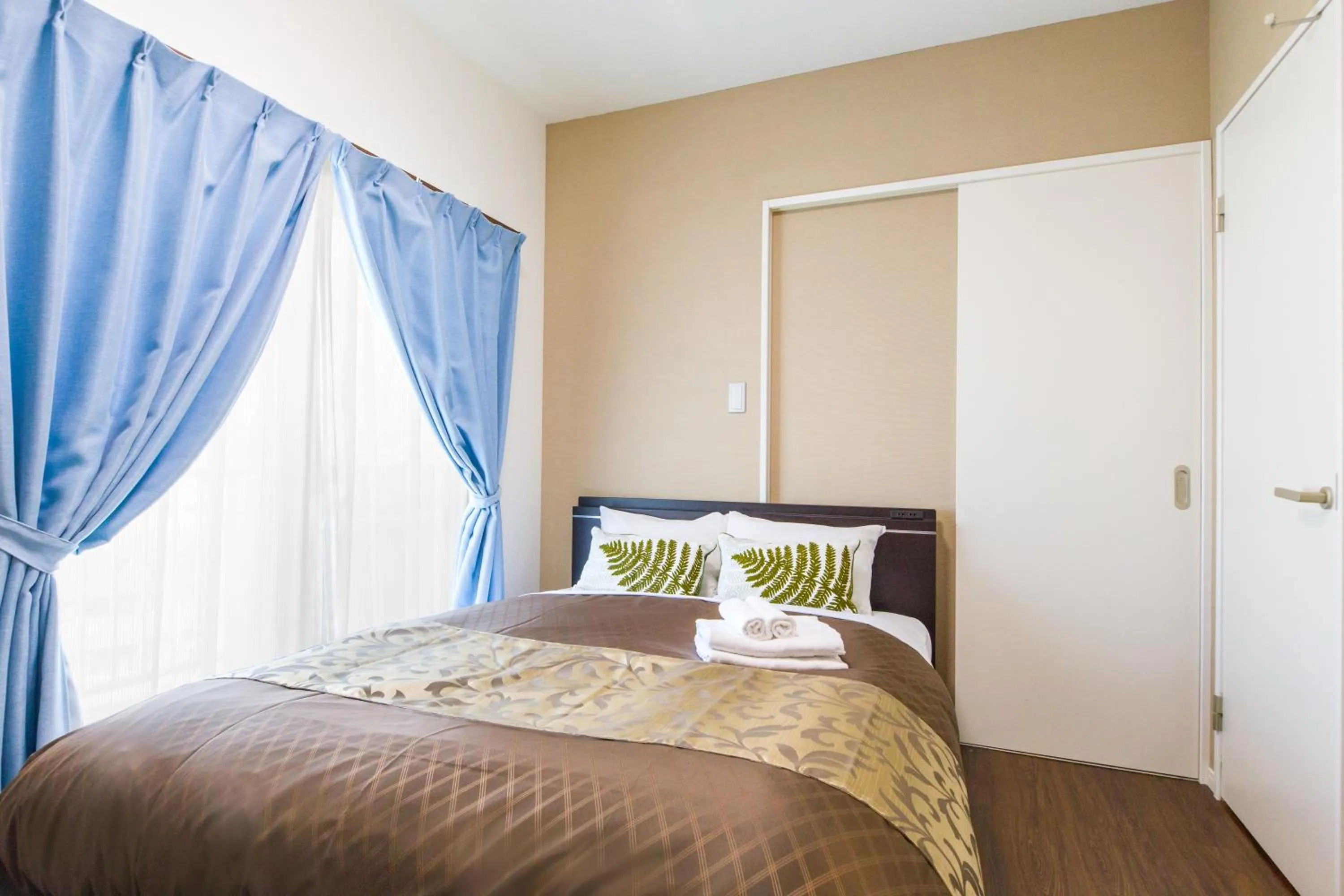 Photo of the whole room, Bed in Mr. Kinjo in Makishi