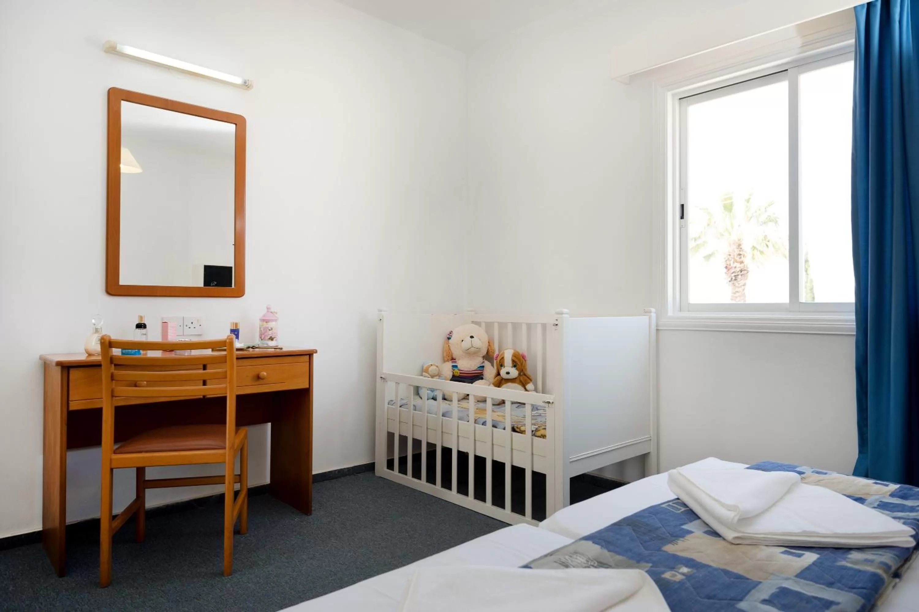 Bed in Sunny Hill Hotel Apartments