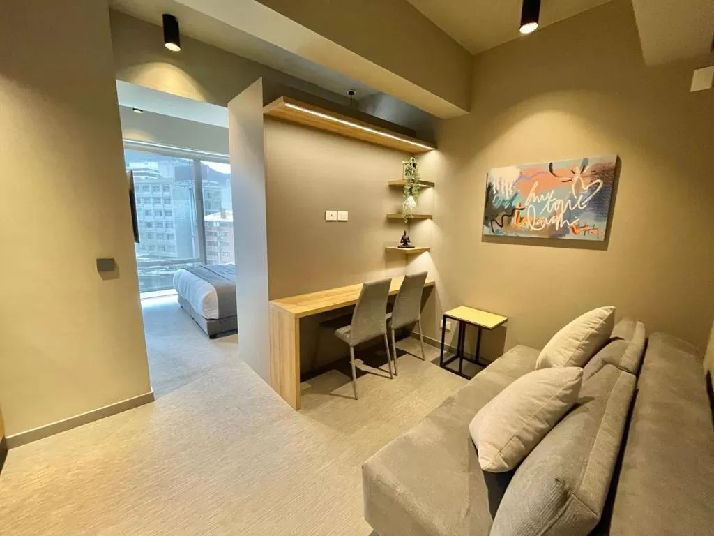 Living room, Seating Area in ICON 100 Luxury Apartasuites