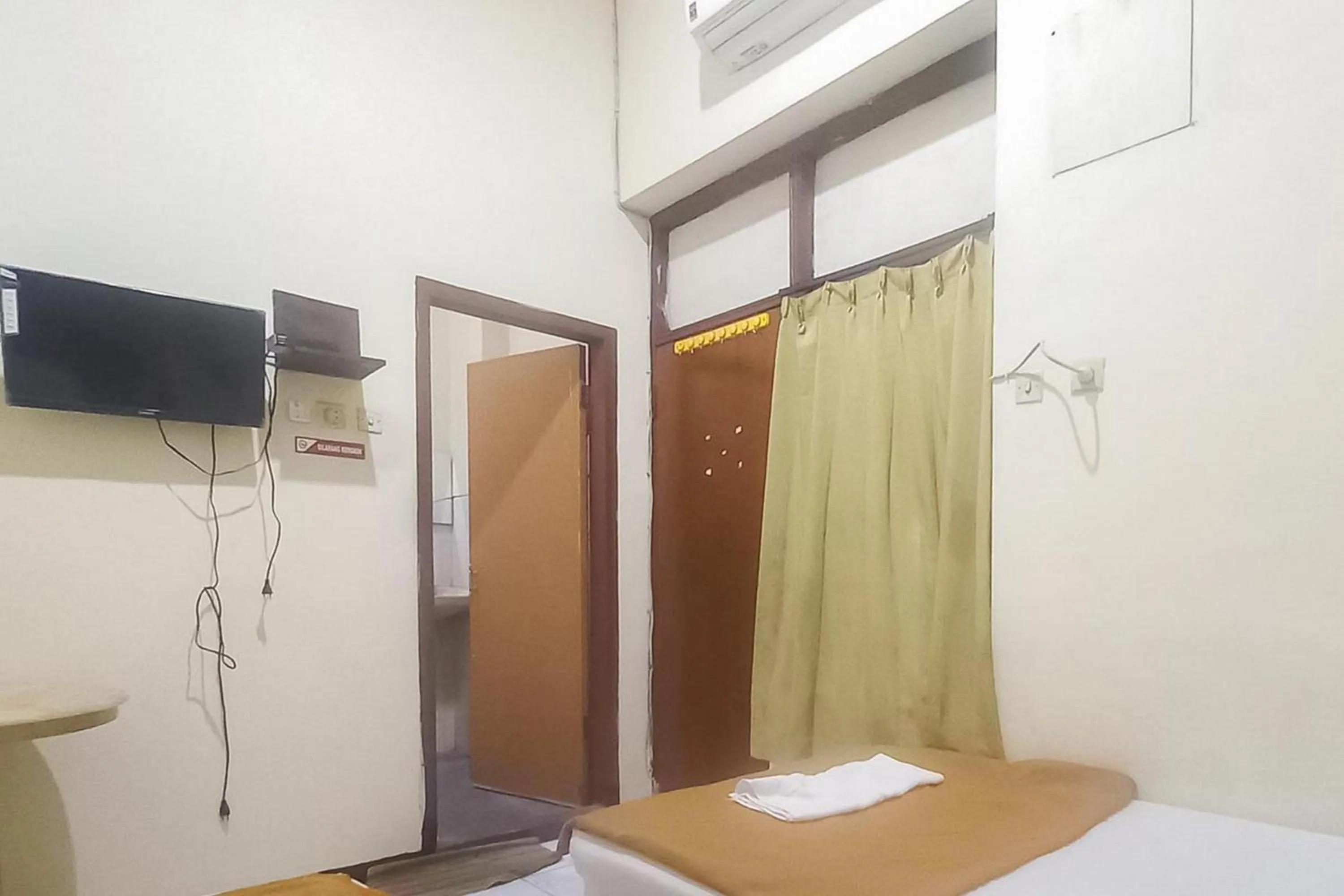 Bed in Hotel Malang near Alun Alun Malang RedPartner