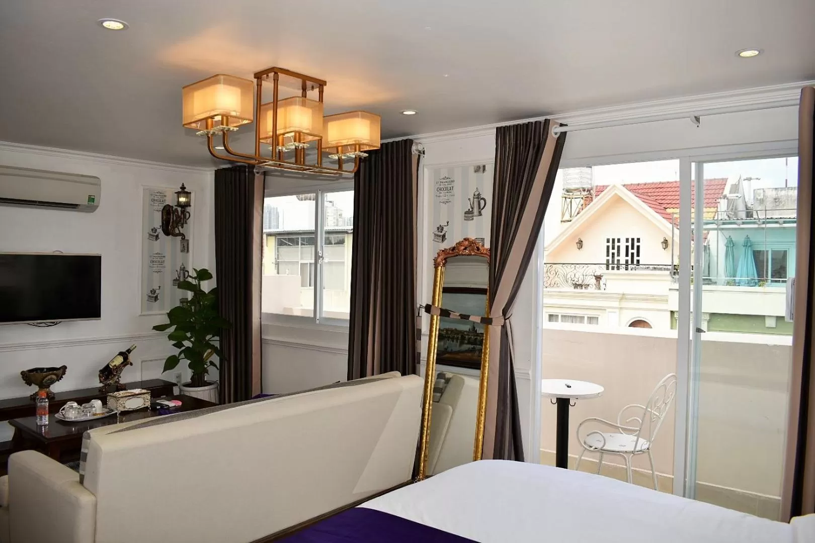 Bed in Saigon By Night Luxury Hotel