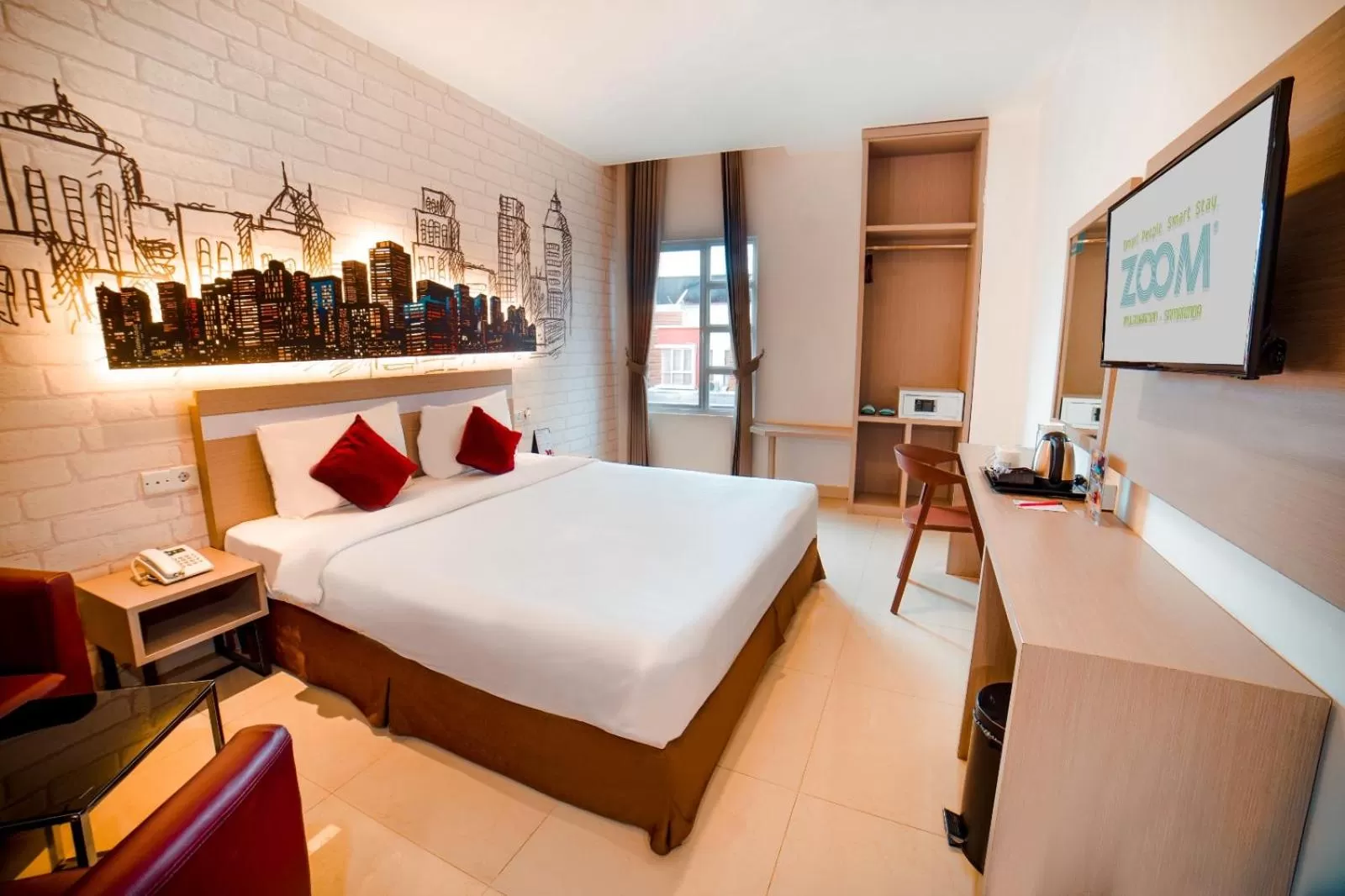 Bed in Zoom Hotel Mulawarman