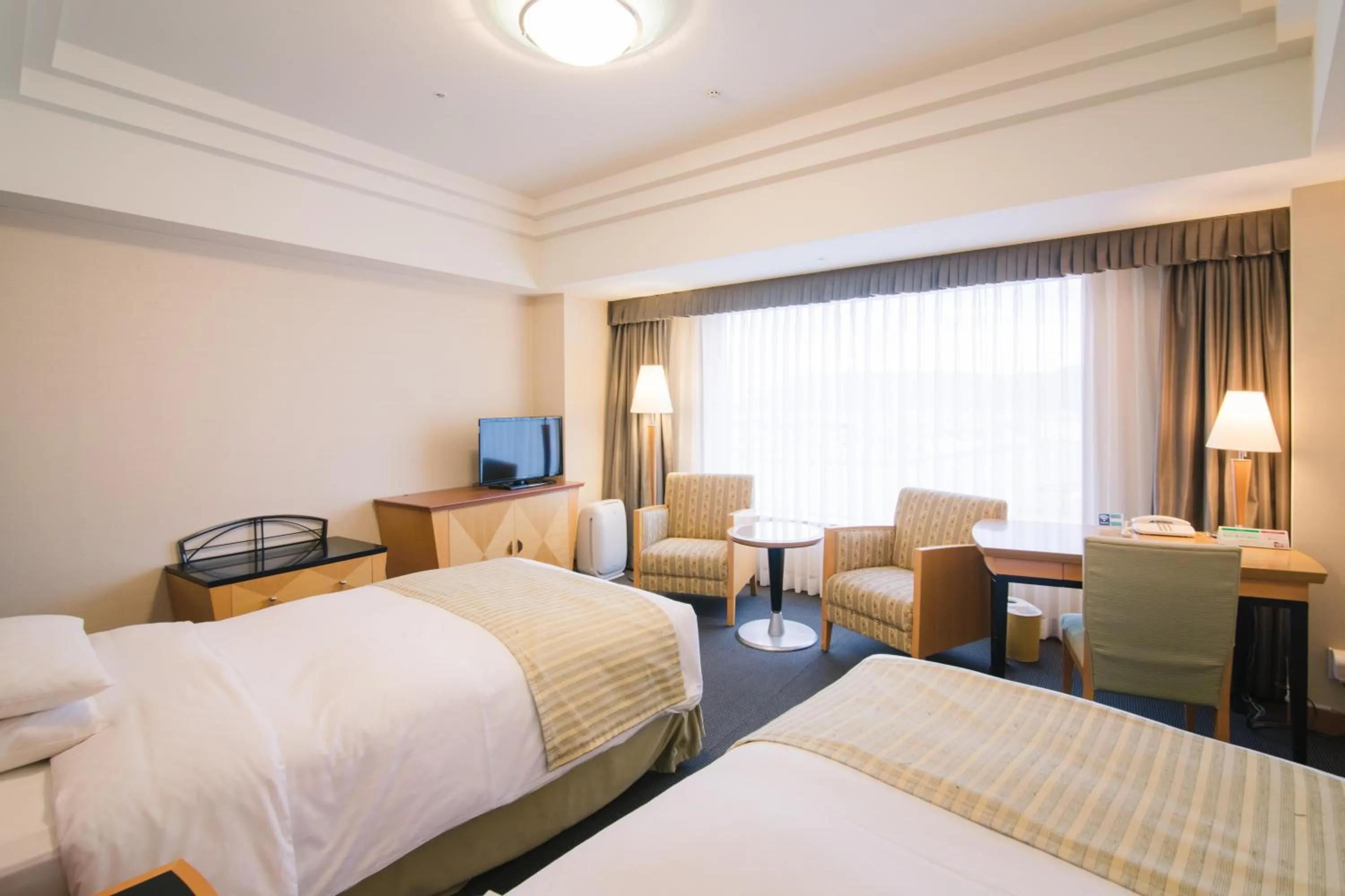 Photo of the whole room, Bed in JR Hotel Clement Takamatsu