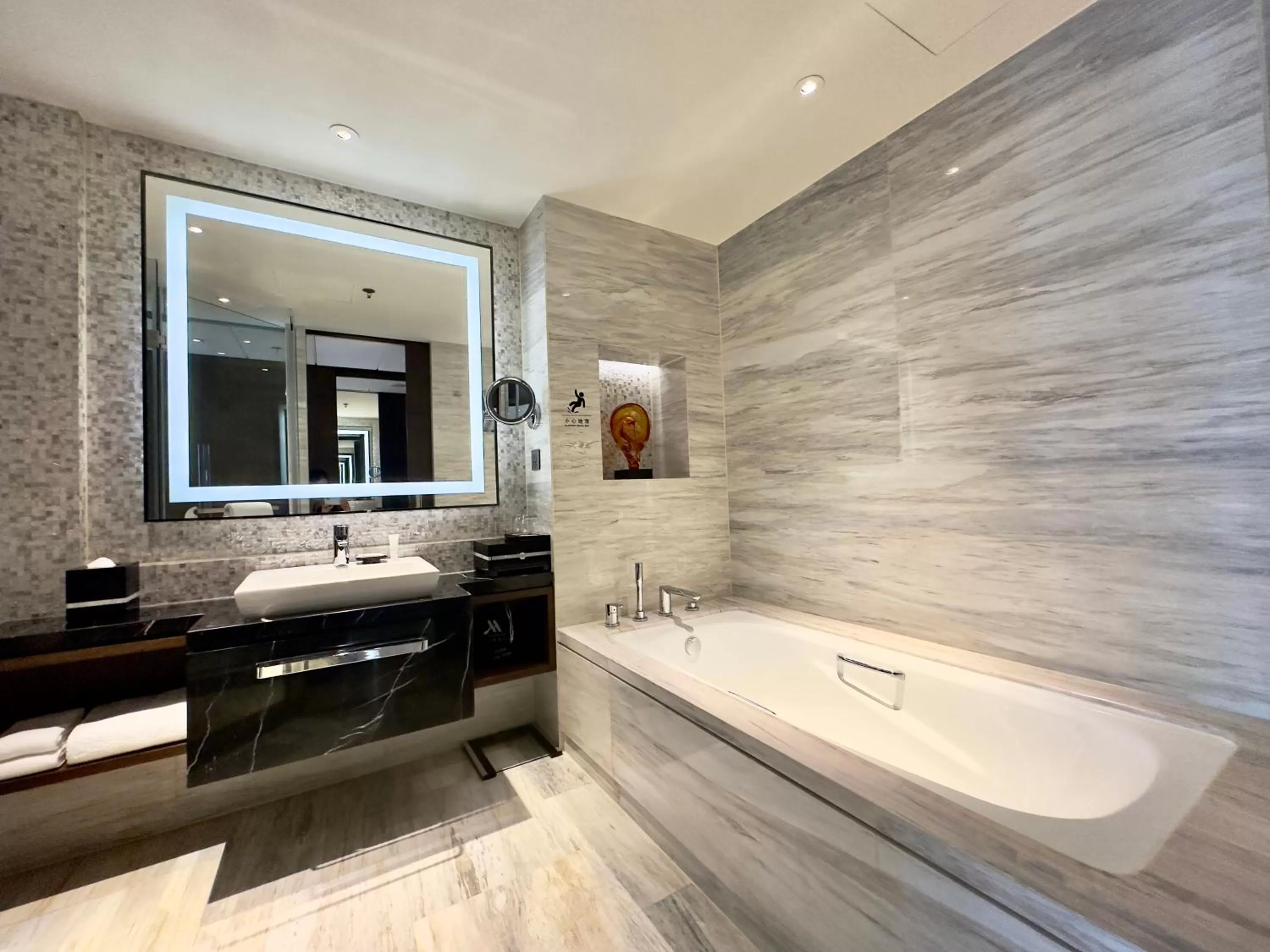 Bathroom in Shanghai Marriott Hotel Pudong East - Only a 20 minute drive from Disney