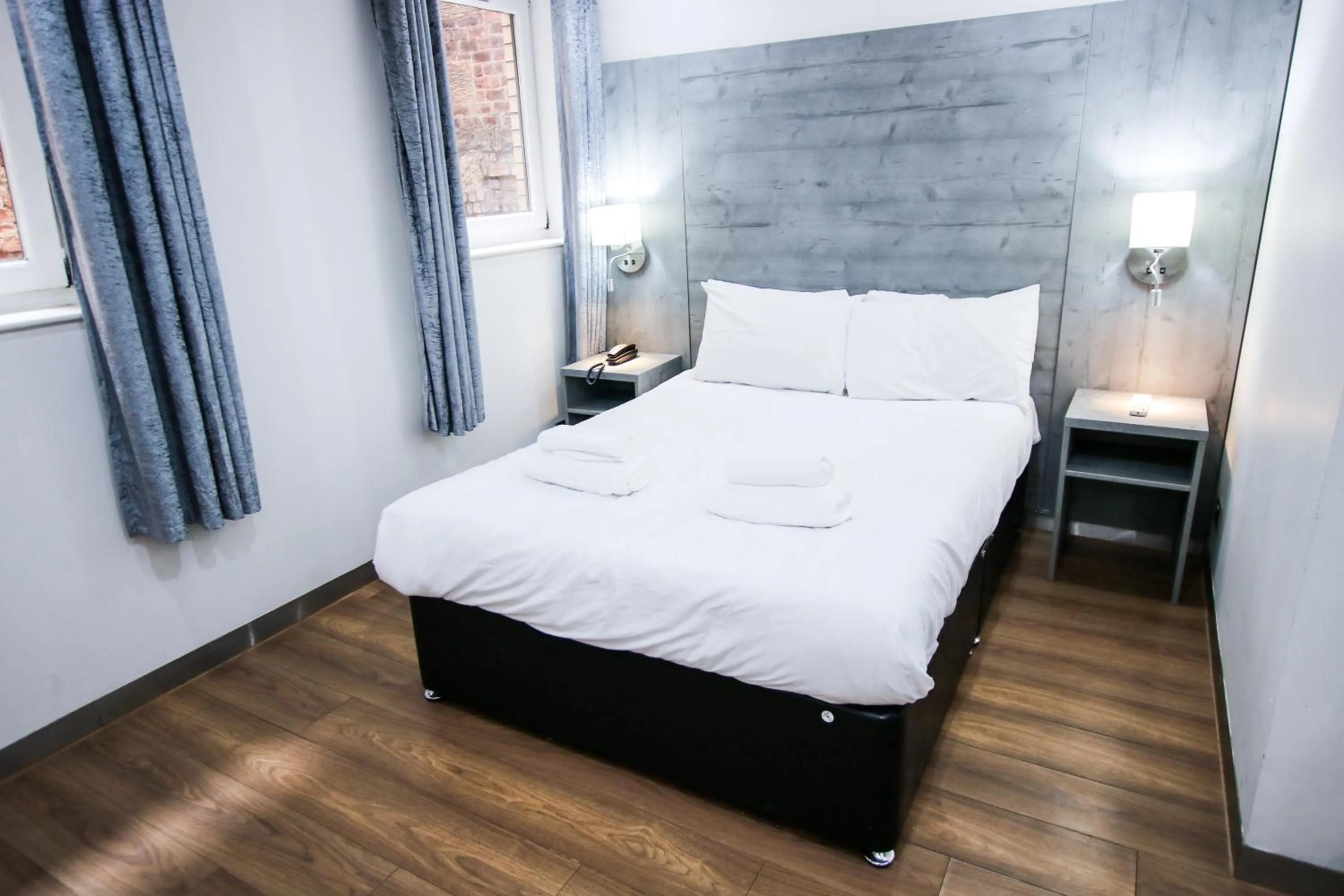 Bed in Brunswick Merchant City Hotel