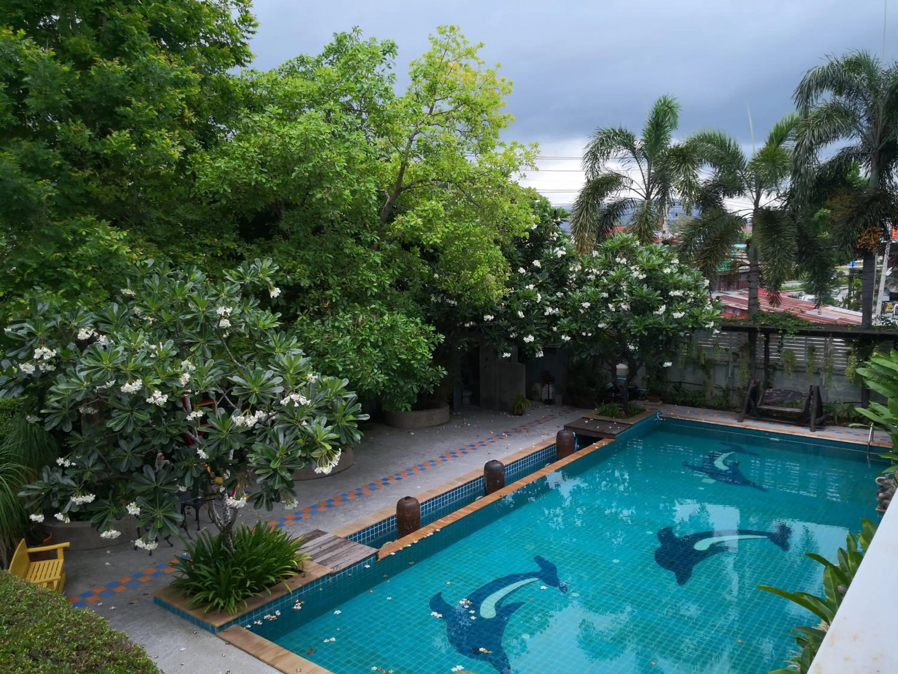 Swimming pool in Baan Suksiri Hotel