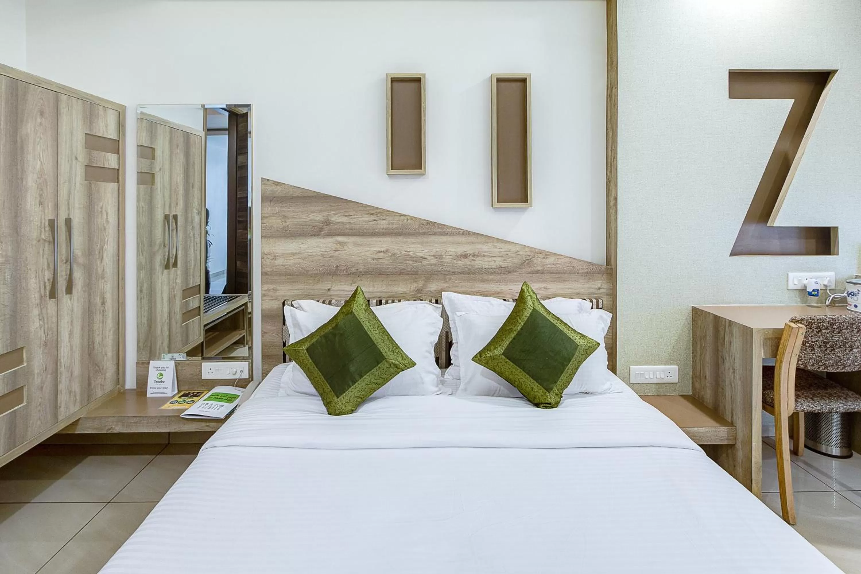 Bed in Treebo Daksh Residency