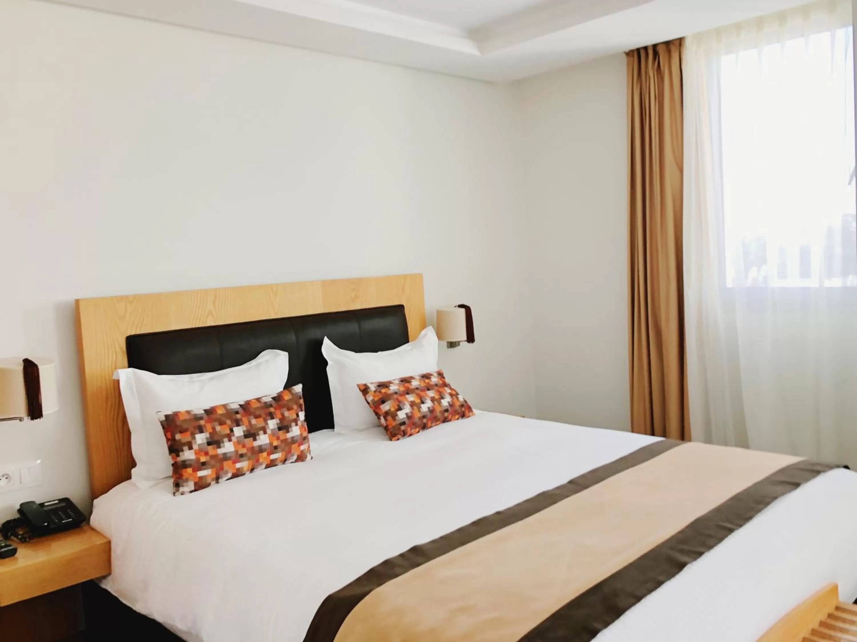 Bed in Le Pietri Urban Hotel