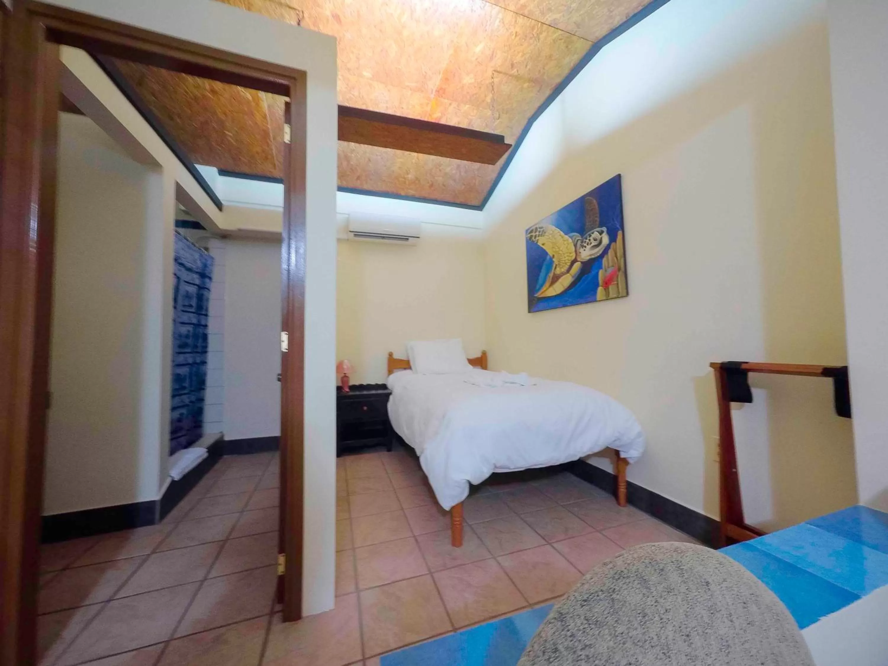 Bed in Rumors Resort Hotel