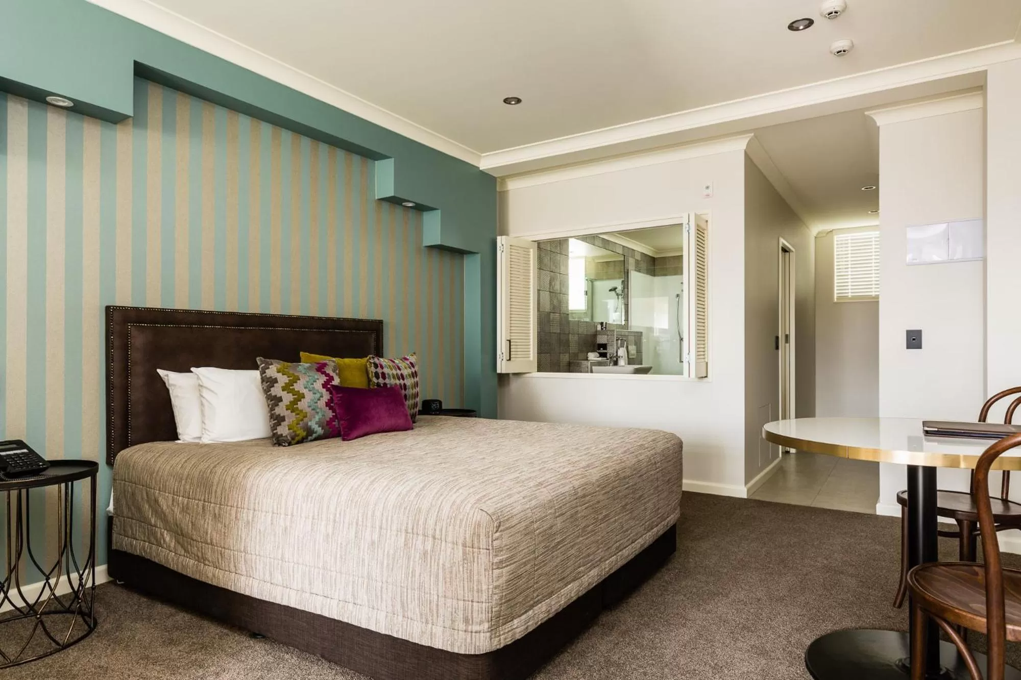 Bed in Pebble Beach Motor Inn