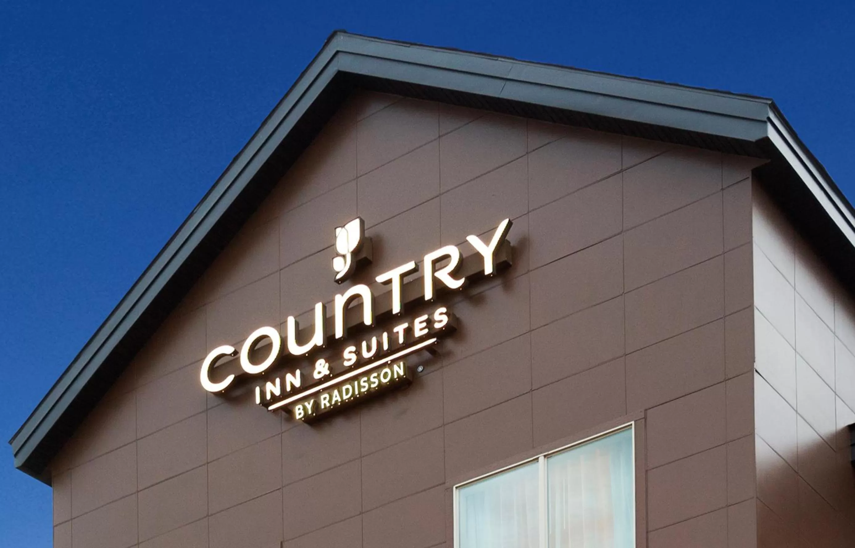 Property logo or sign in Country Inn & Suites by Radisson, Page, AZ