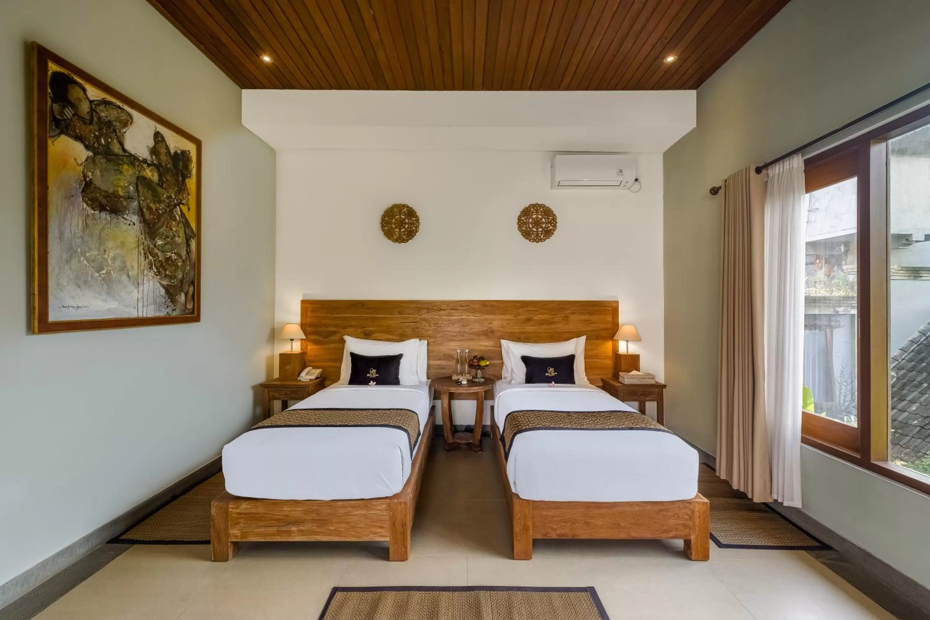 Bed in Kubu Rama Ubud Cottage