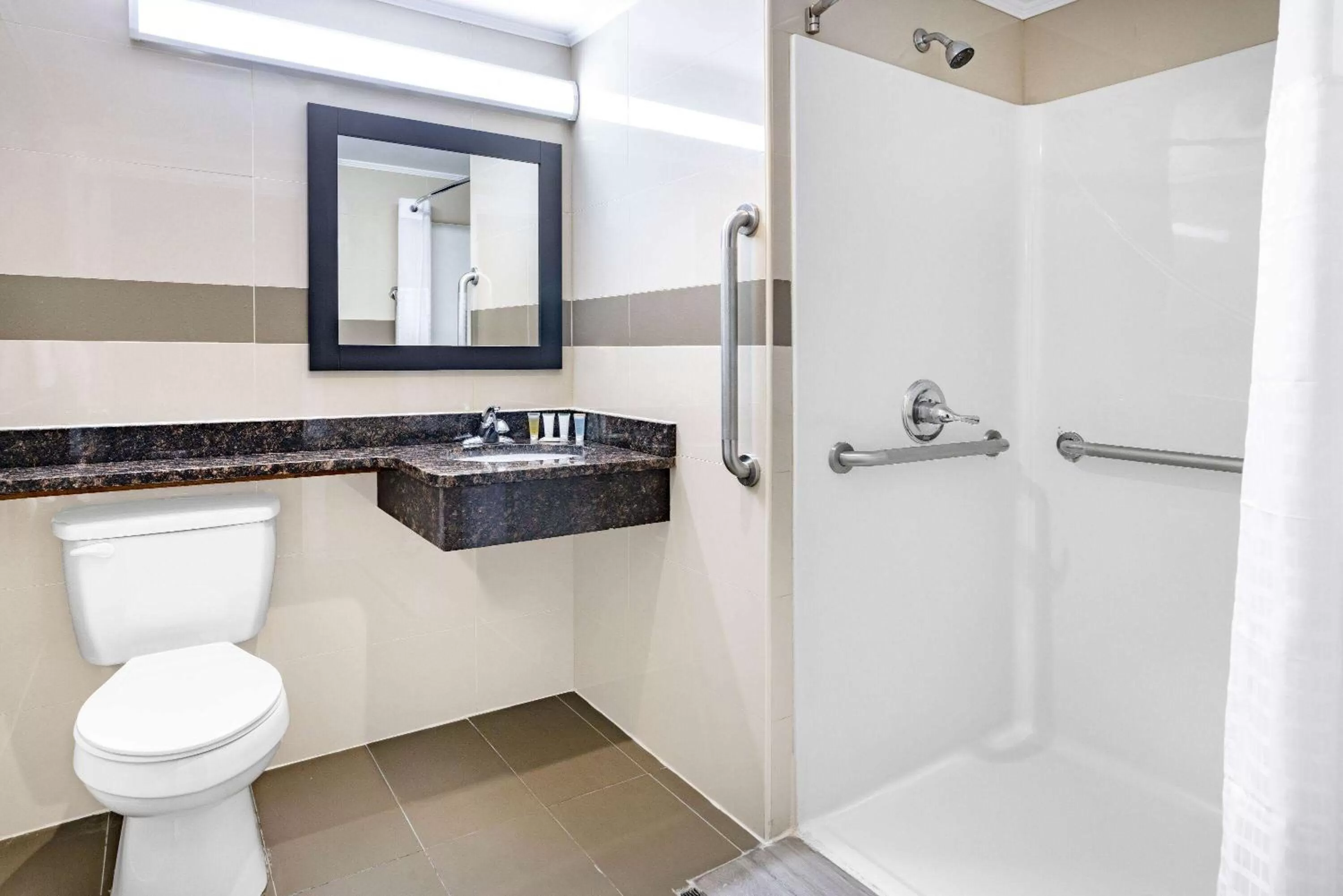 Shower in Super 8 by Wyndham Lindenhurst