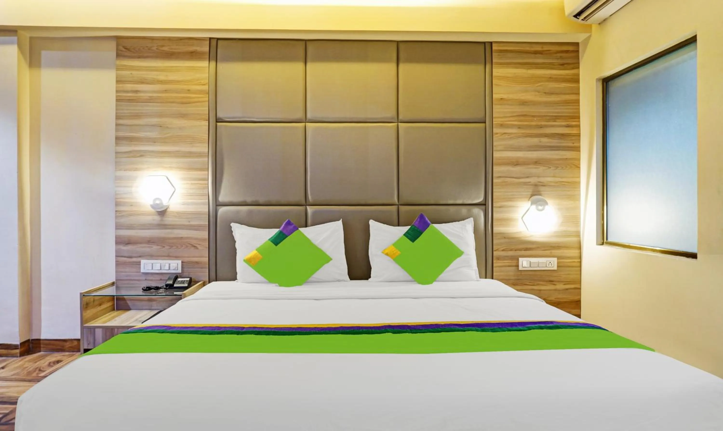 Bedroom, Bed in Treebo Classic Grande, Camp