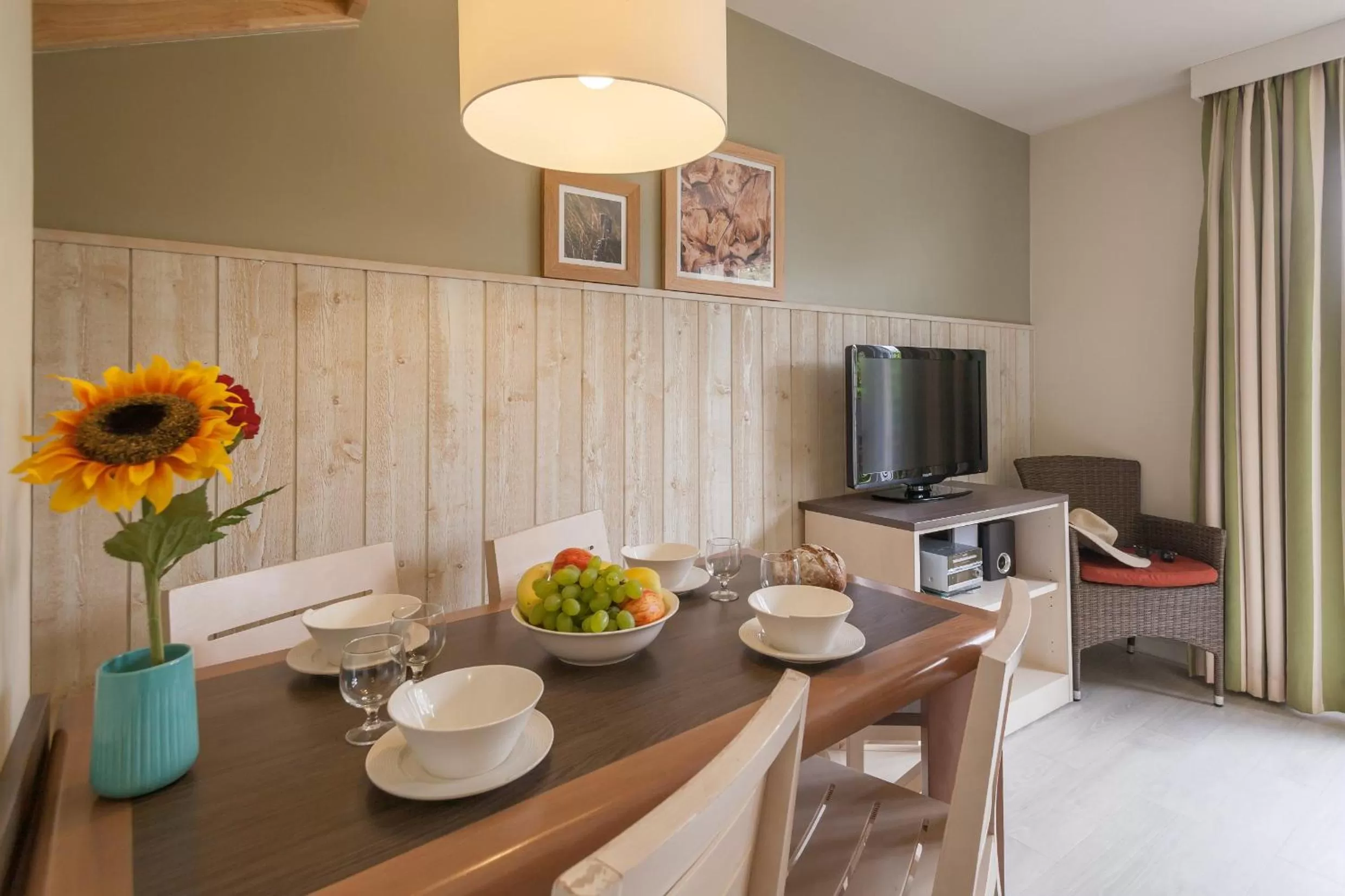 Communal lounge/ TV room in Village Pierre & Vacances Normandy Garden