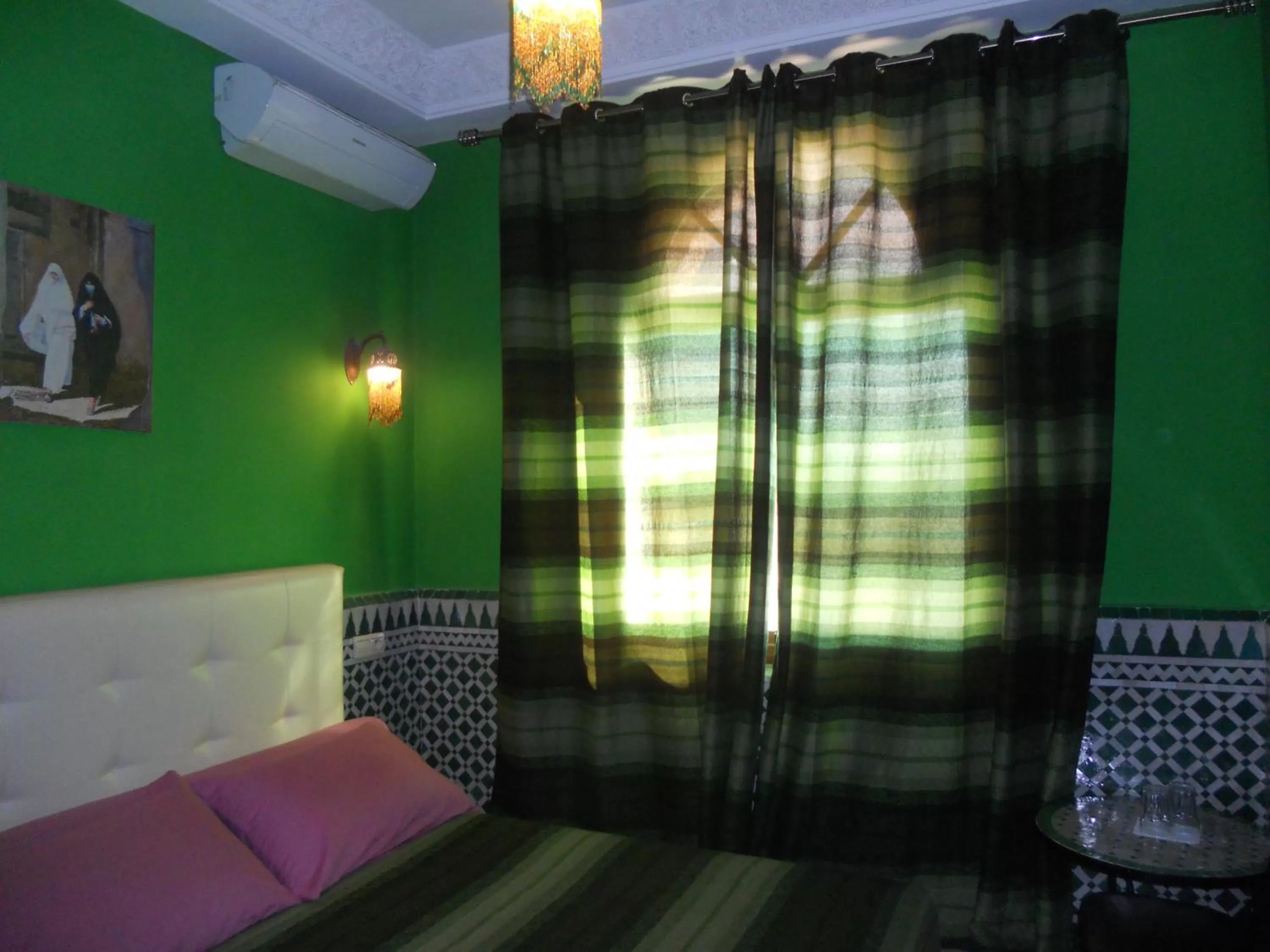 Bed in Riad Passiflora