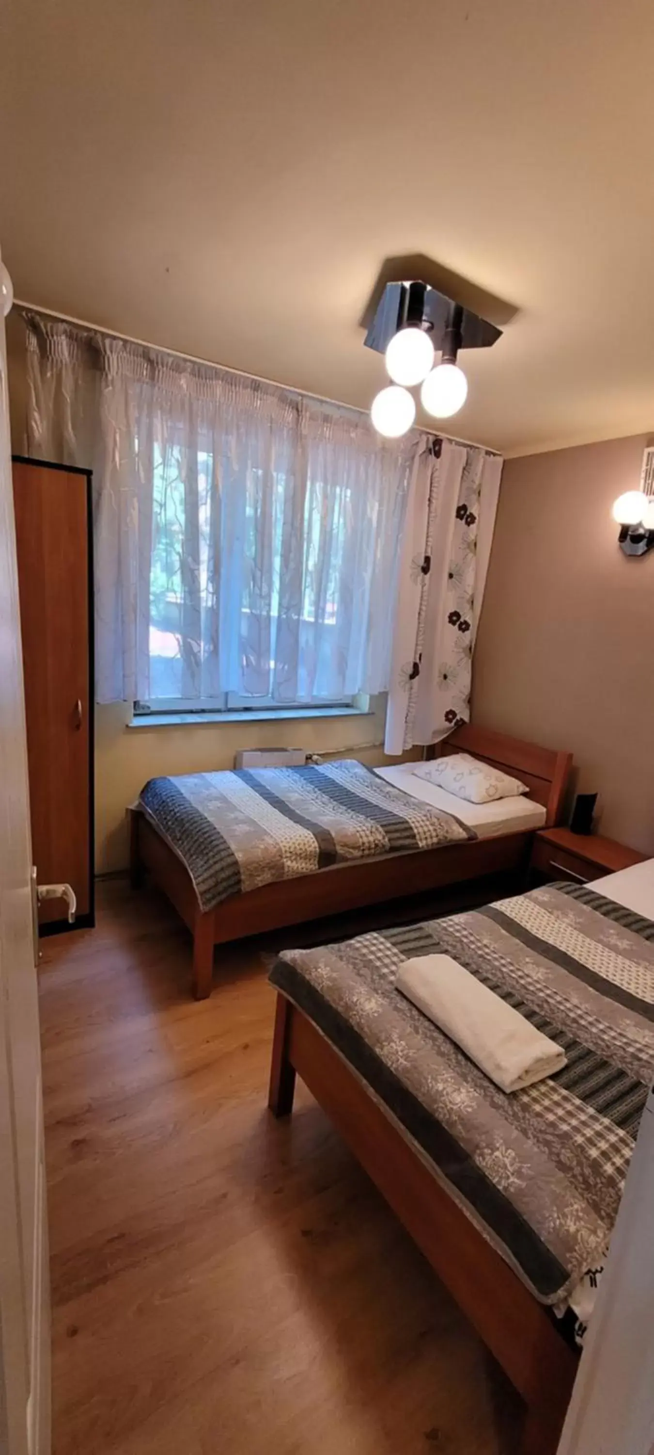 Quadruple Room with Private Bathroom in Dworek Pokoje Gościnne Quadruple Room with Private Bathroom in Dworek Pokoje Gościnne