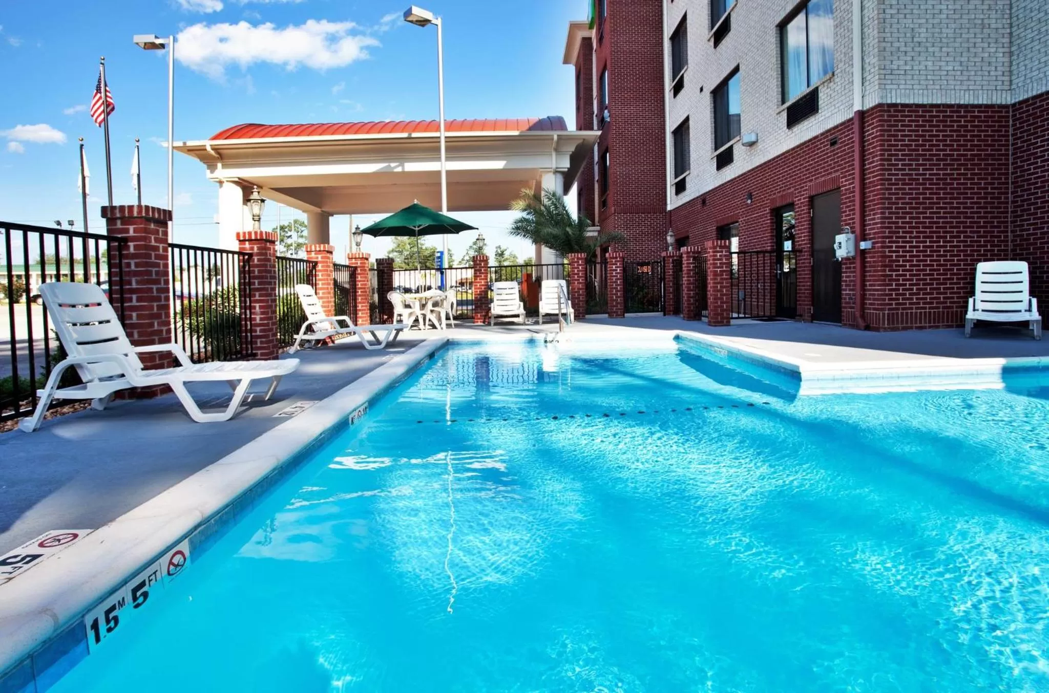 Swimming pool in Holiday Inn Express Hotel & Suites Biloxi- Ocean Springs by IHG
