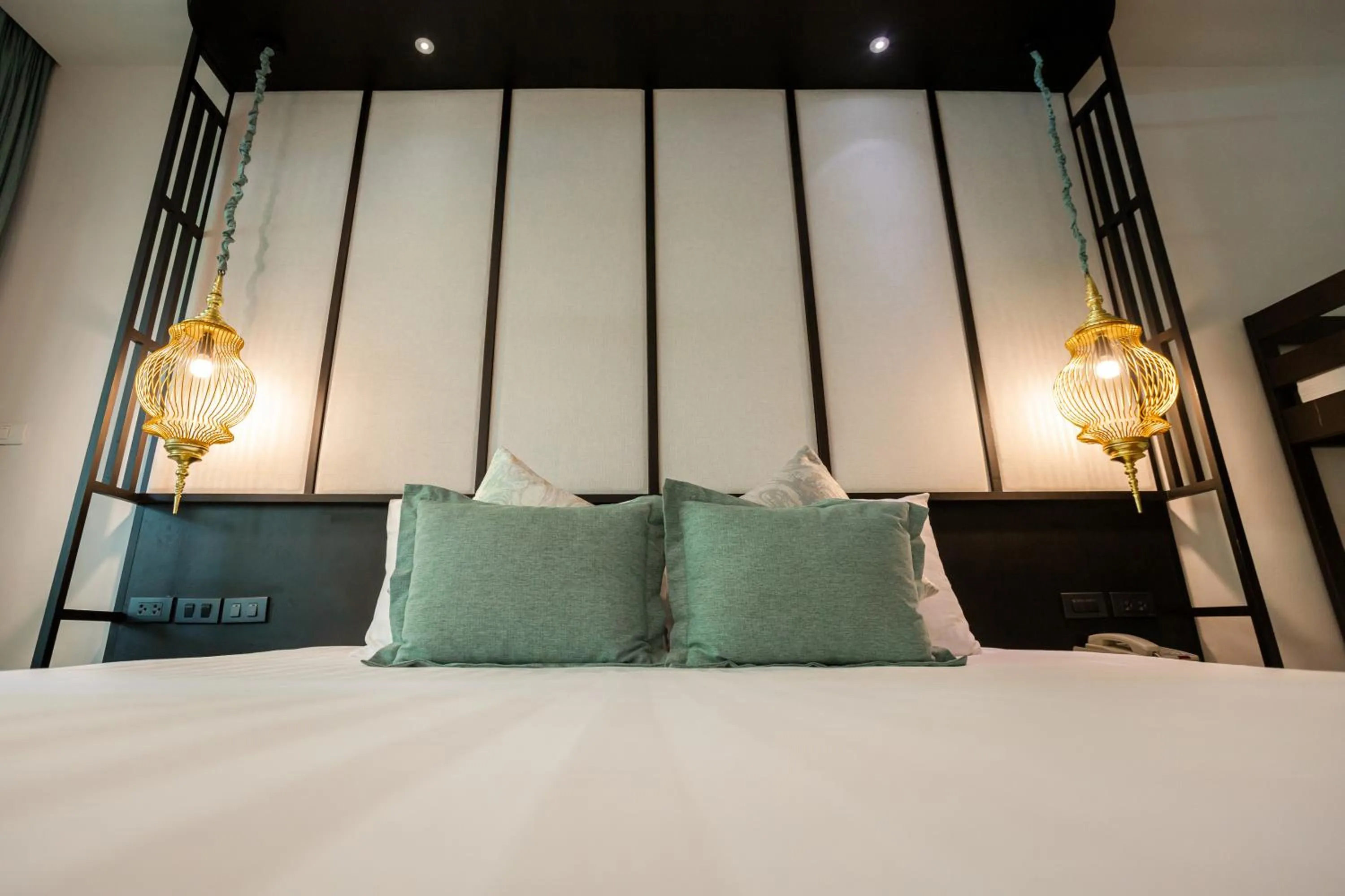 Bed in Ravindra Beach Resort & Spa - SHA Extra Plus