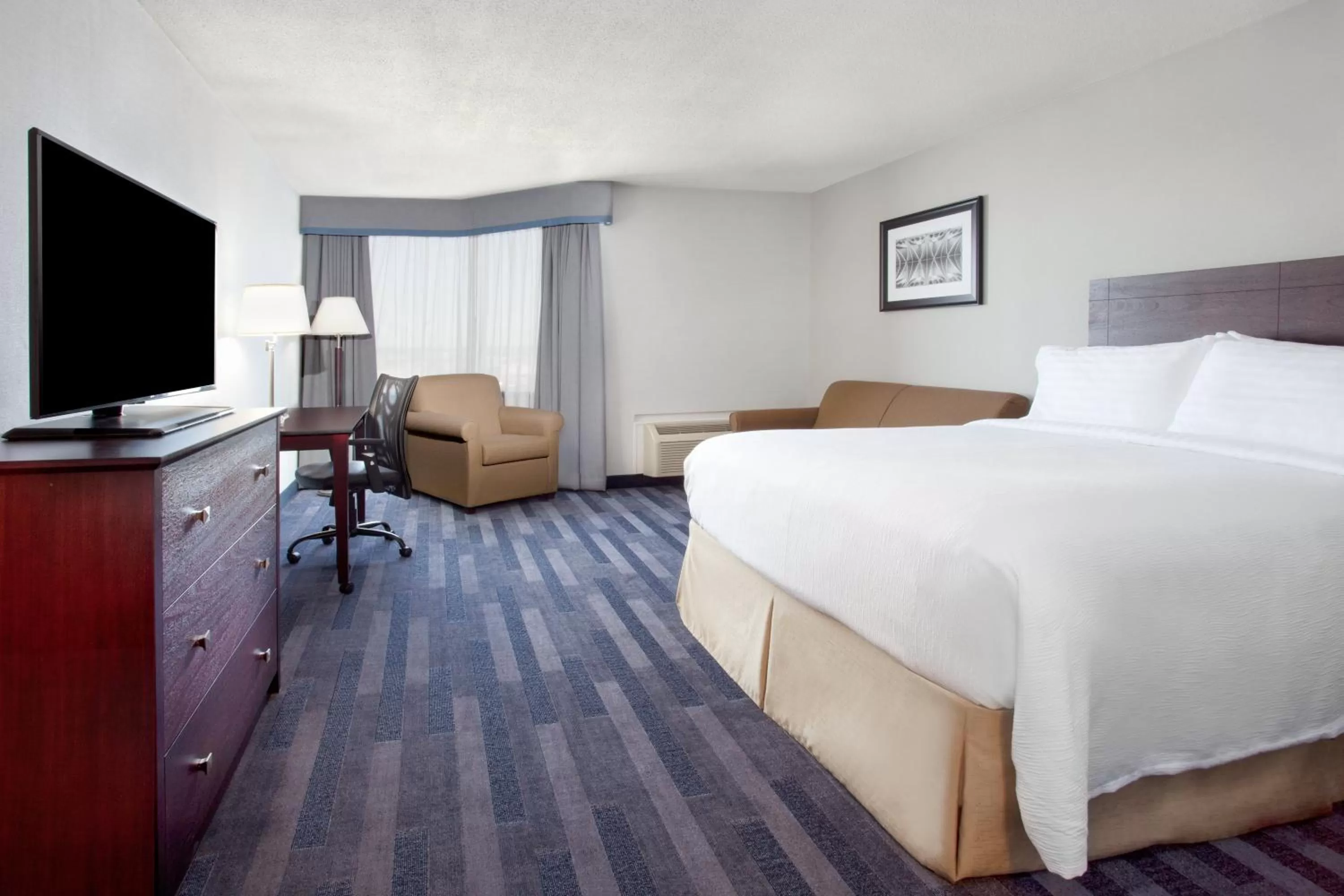Photo of the whole room, Bed in Holiday Inn Ottawa East by IHG