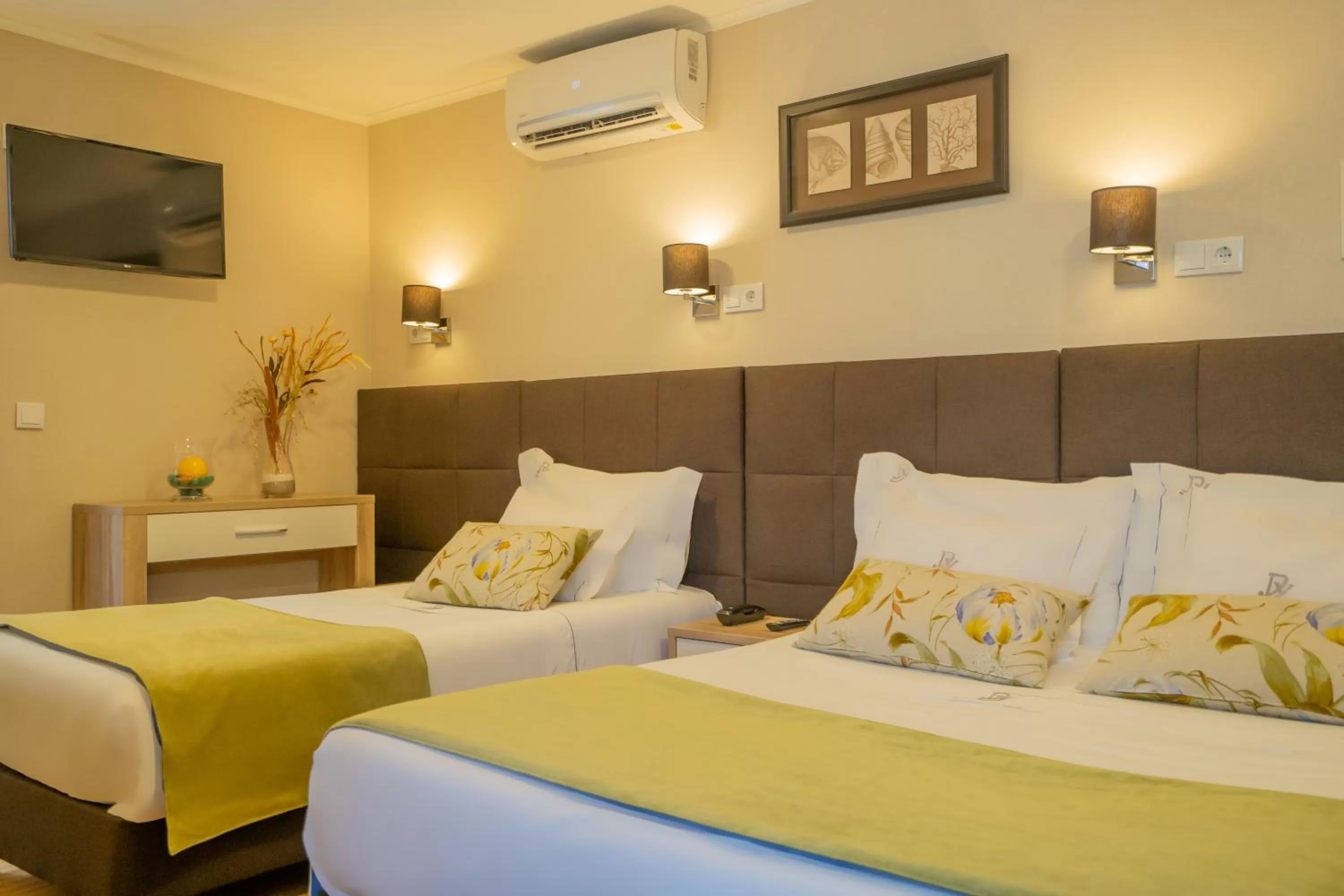 Bed in Dinya Lisbon Hotel