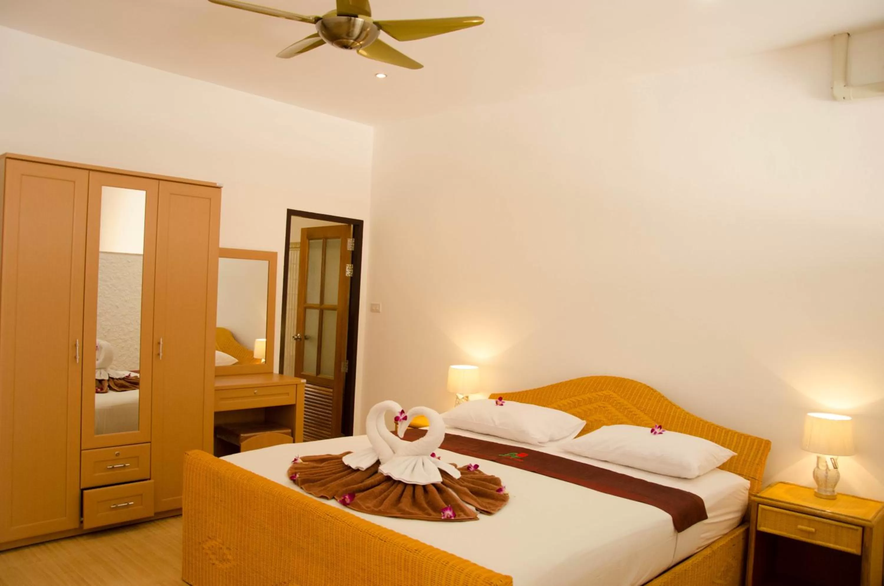 Bed in Jungle Village Bungalow