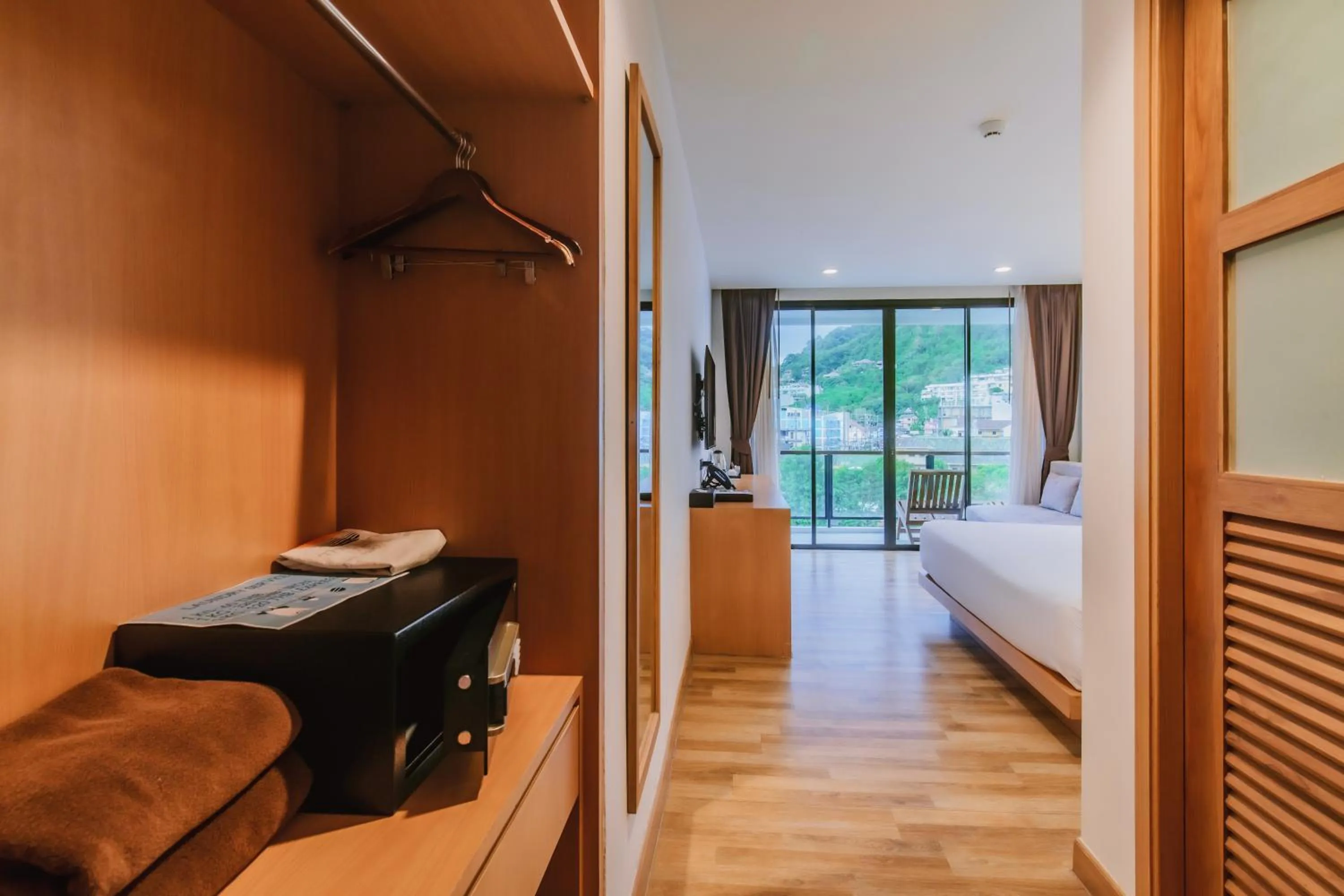 Photo of the whole room, Bed in The Lunar Patong