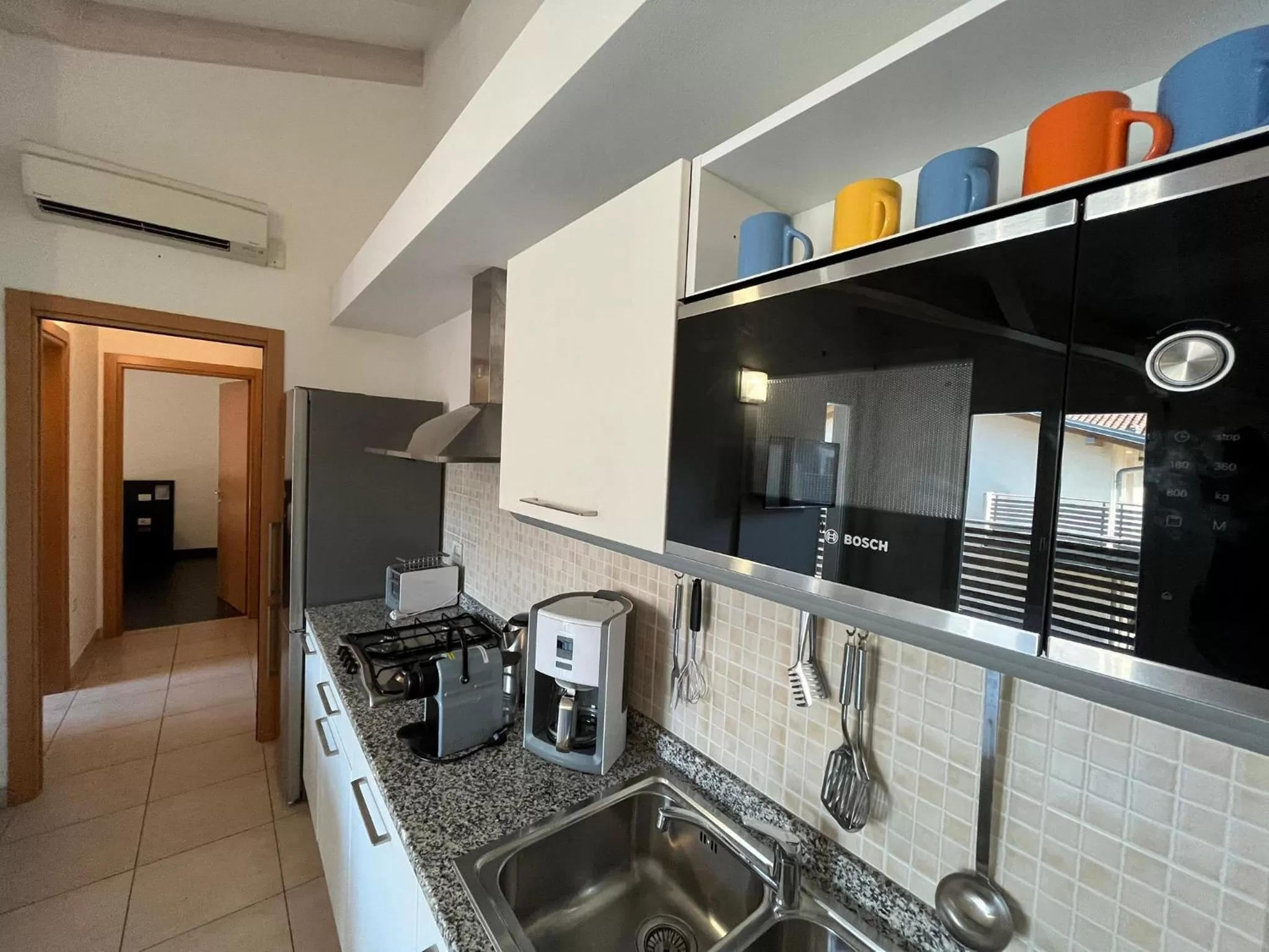 Kitchen or kitchenette in 4 Limoni Apartment Resort