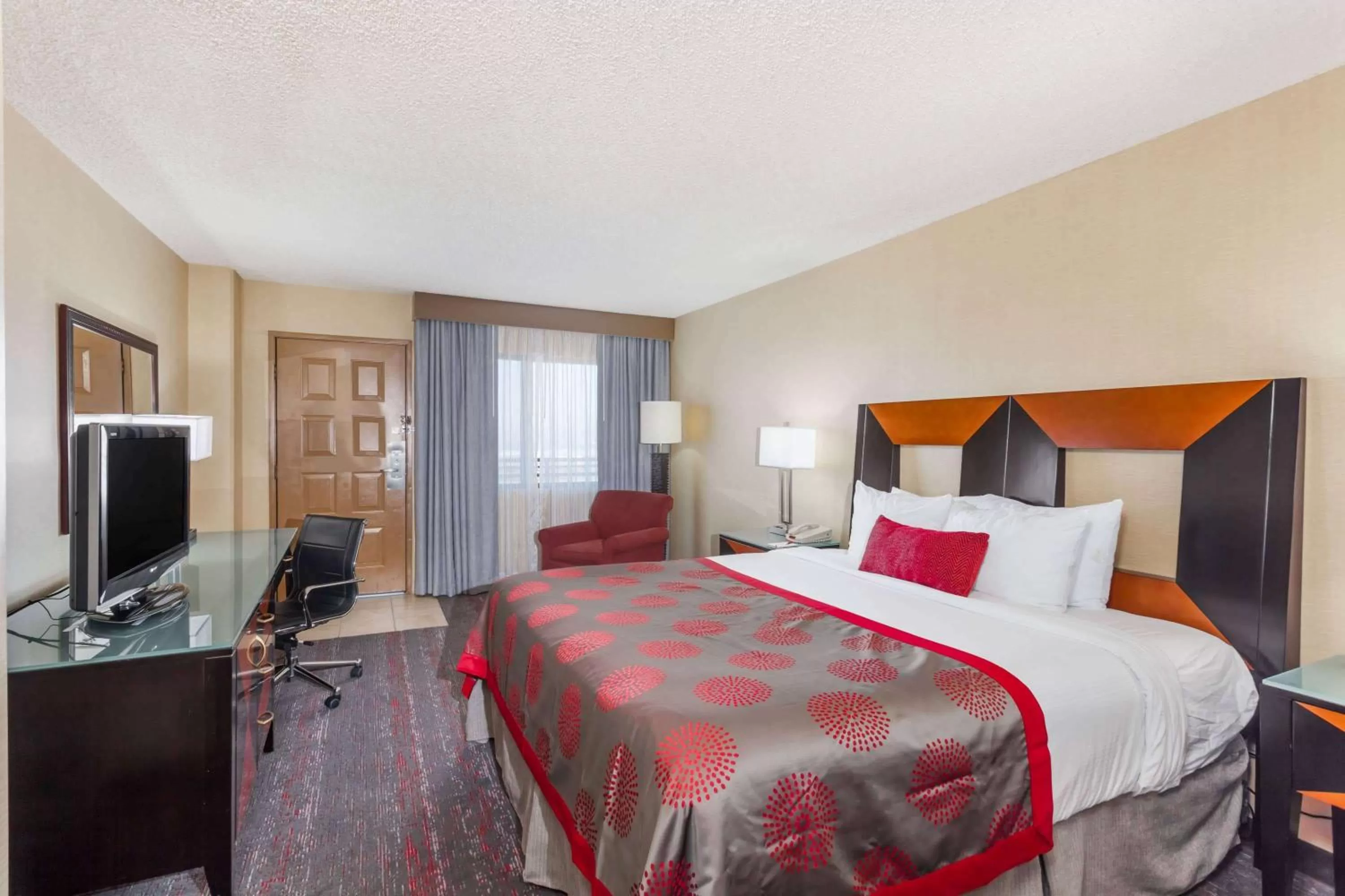 Photo of the whole room, Bed in Ramada by Wyndham San Diego National City