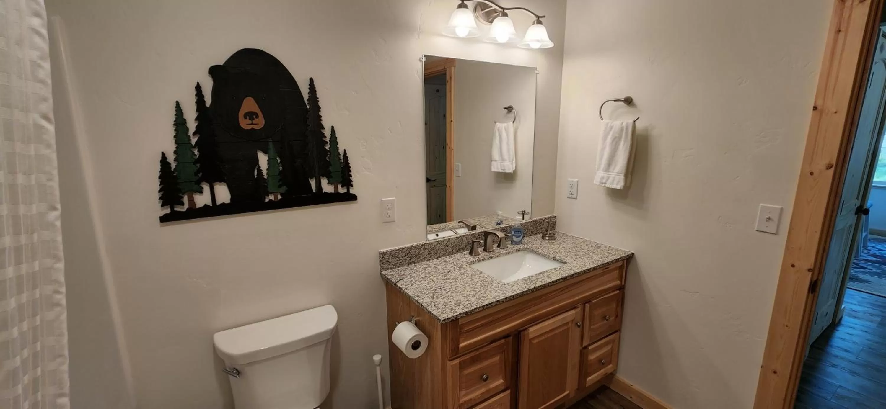 Toilet in Beargrass Lodging & RV Resort