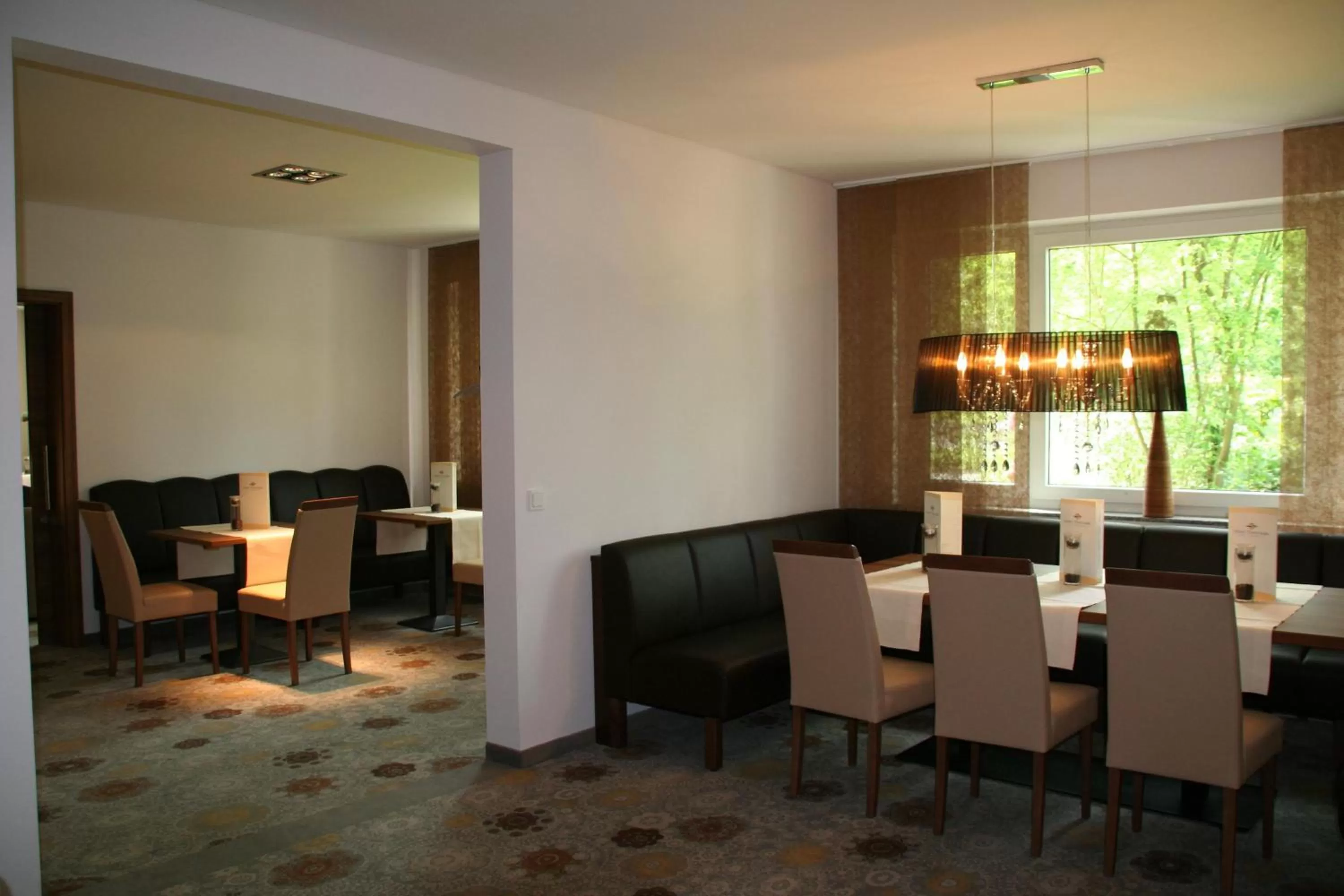 Lounge or bar in Thermalis - Das Boardinghouse im Kurpark Bad Hersfeld