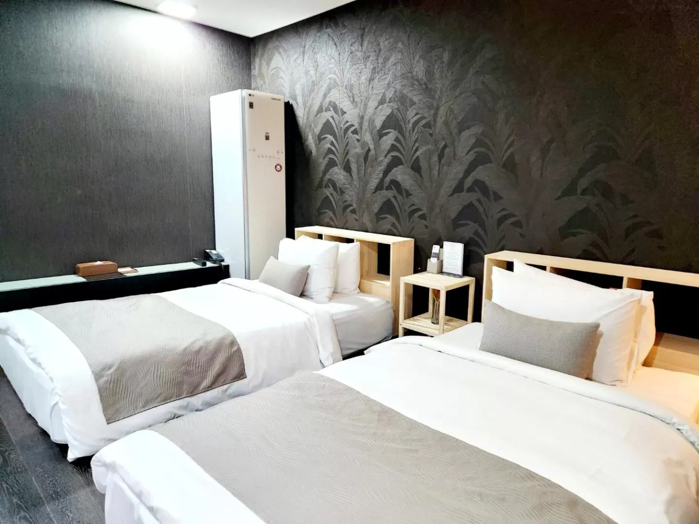 Bed in JS Boutique Hotel